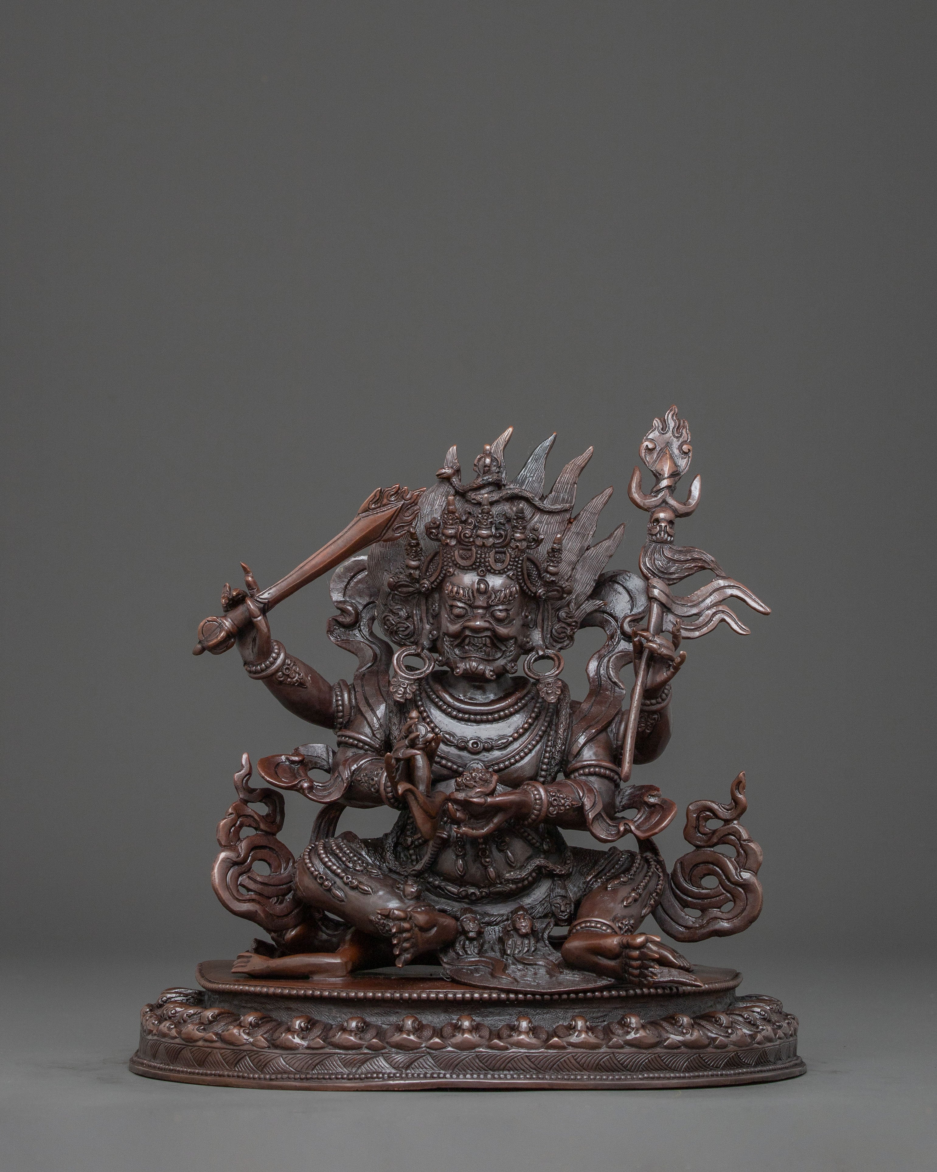 Four Armed Mahakala Statue in Oxidized Copper