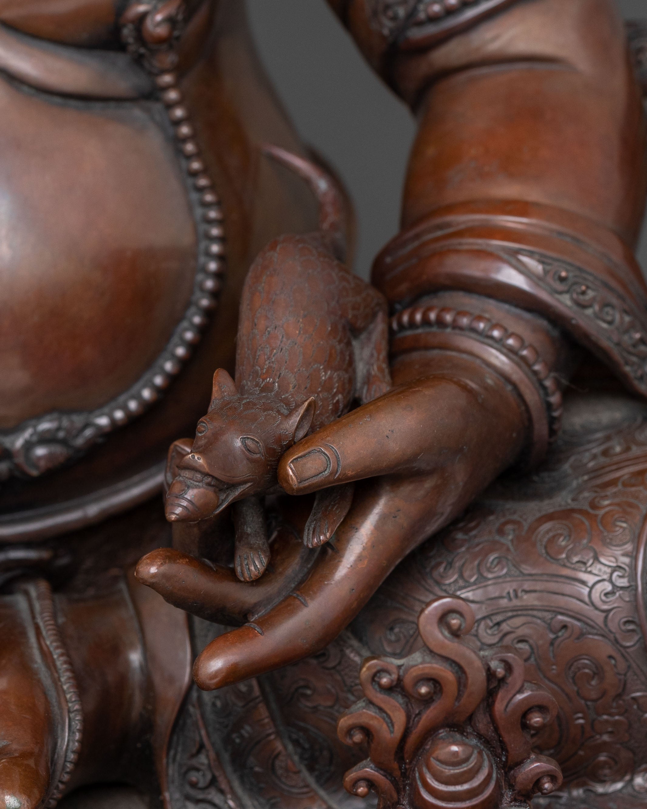 Deity of Wealth: Dzambhala Oxidized Copper Statue