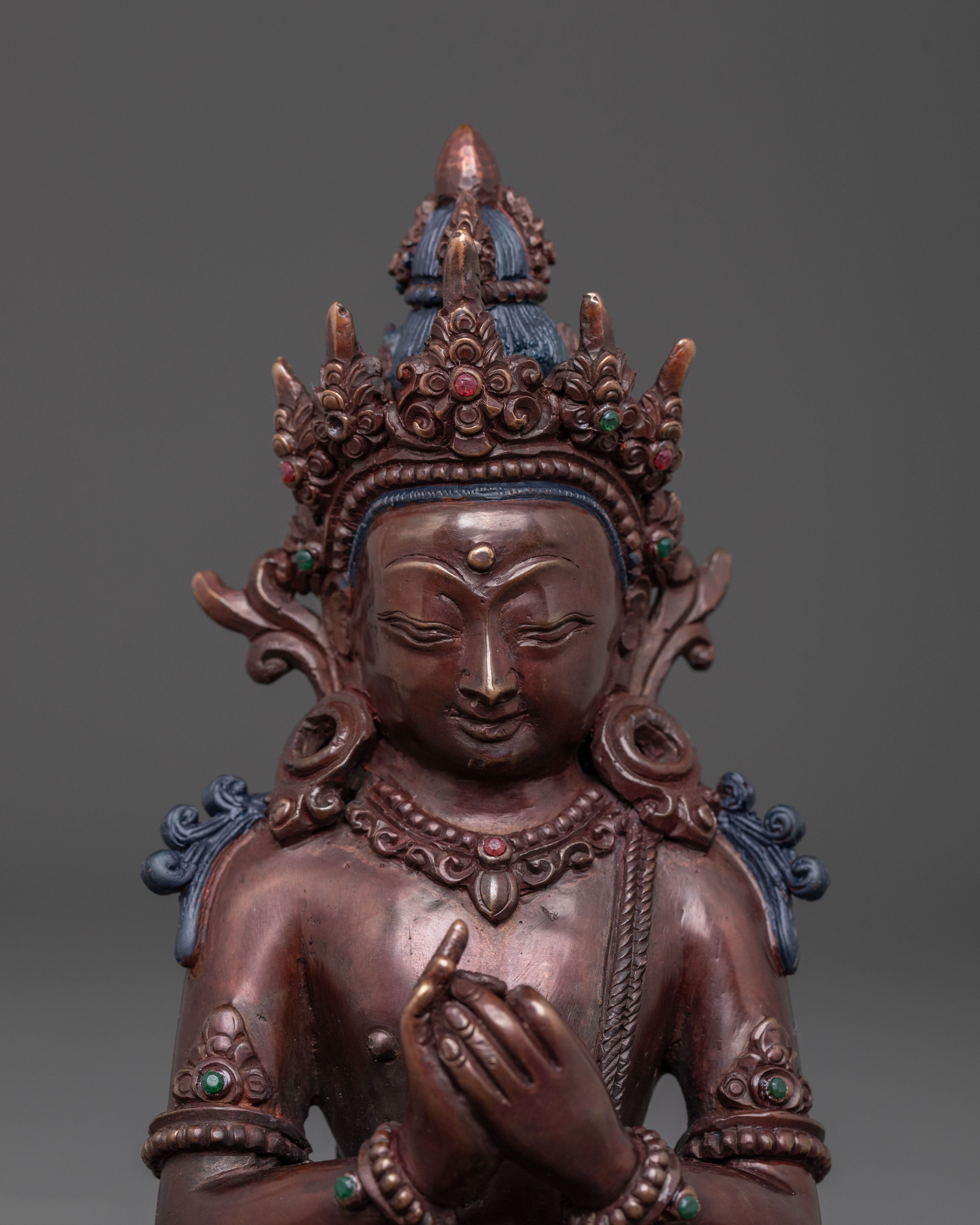 A tranquil Buddha Vairocana Copper Statue | Oxidized Finish