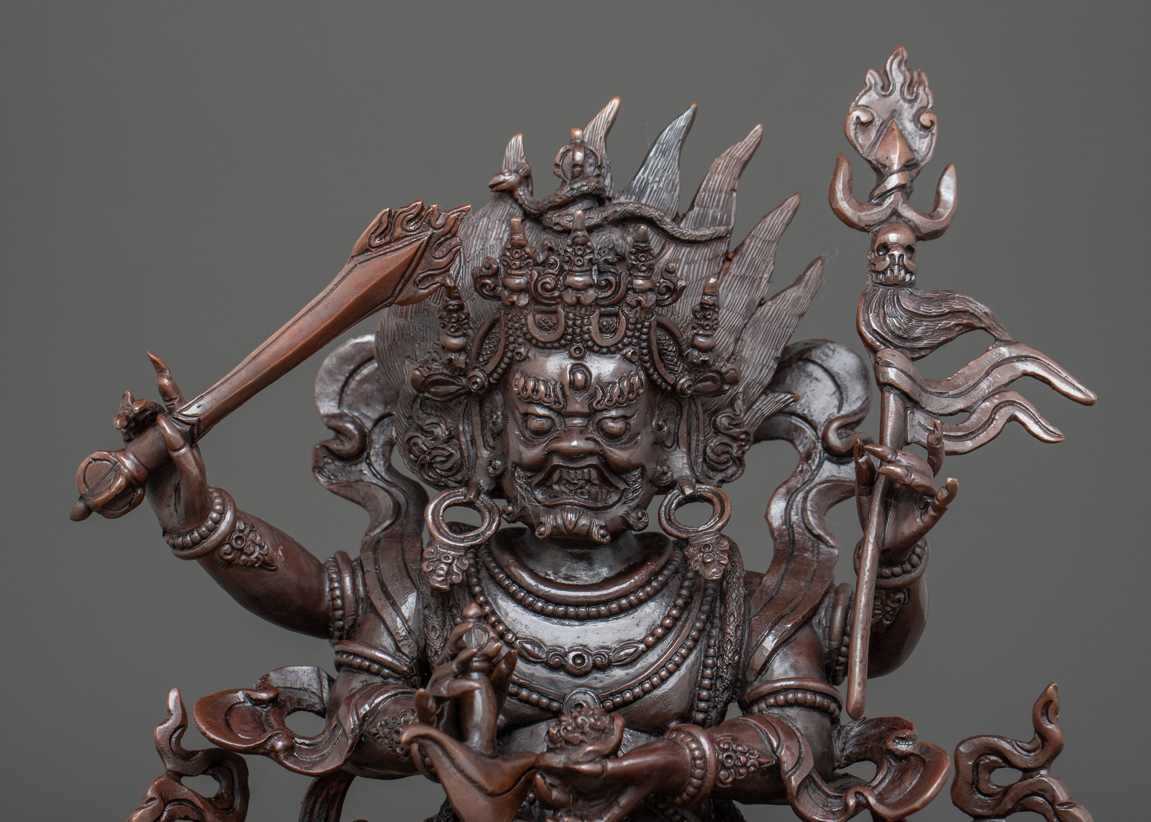 Four Armed Mahakala Statue in Oxidized Copper