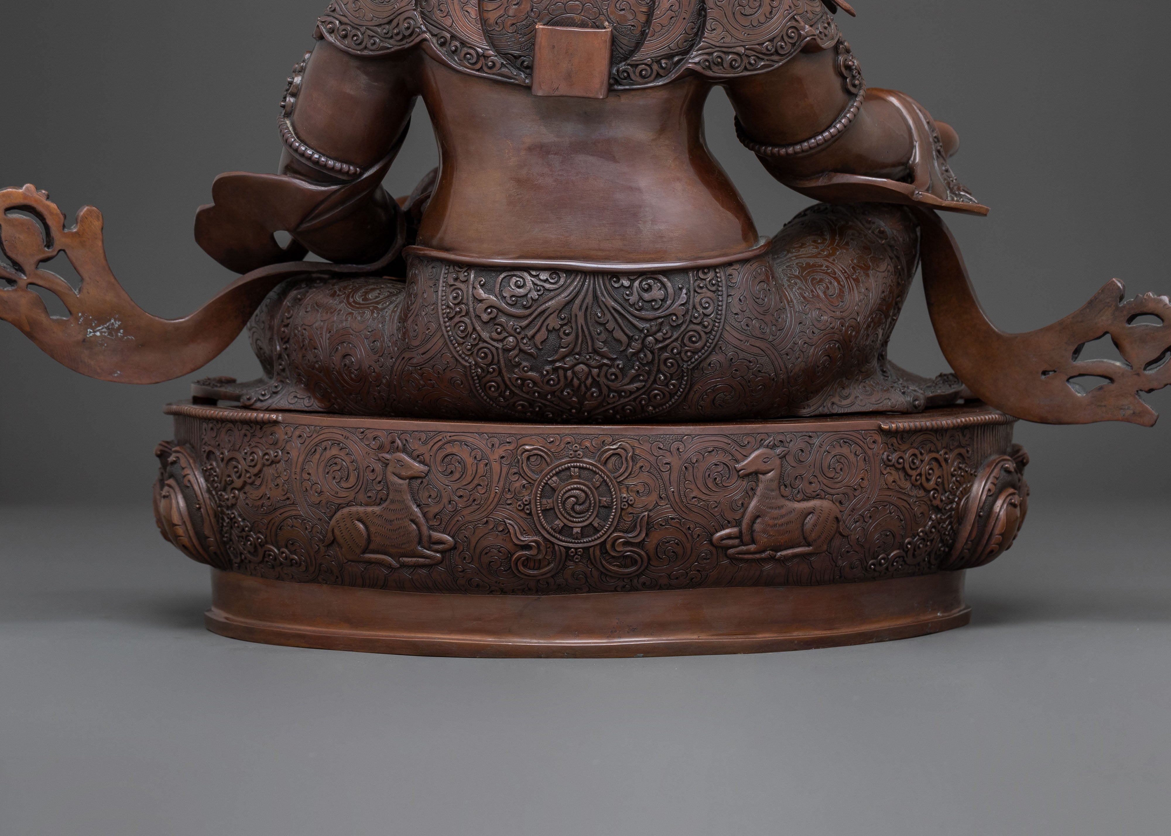 Deity of Wealth: Dzambhala Oxidized Copper Statue