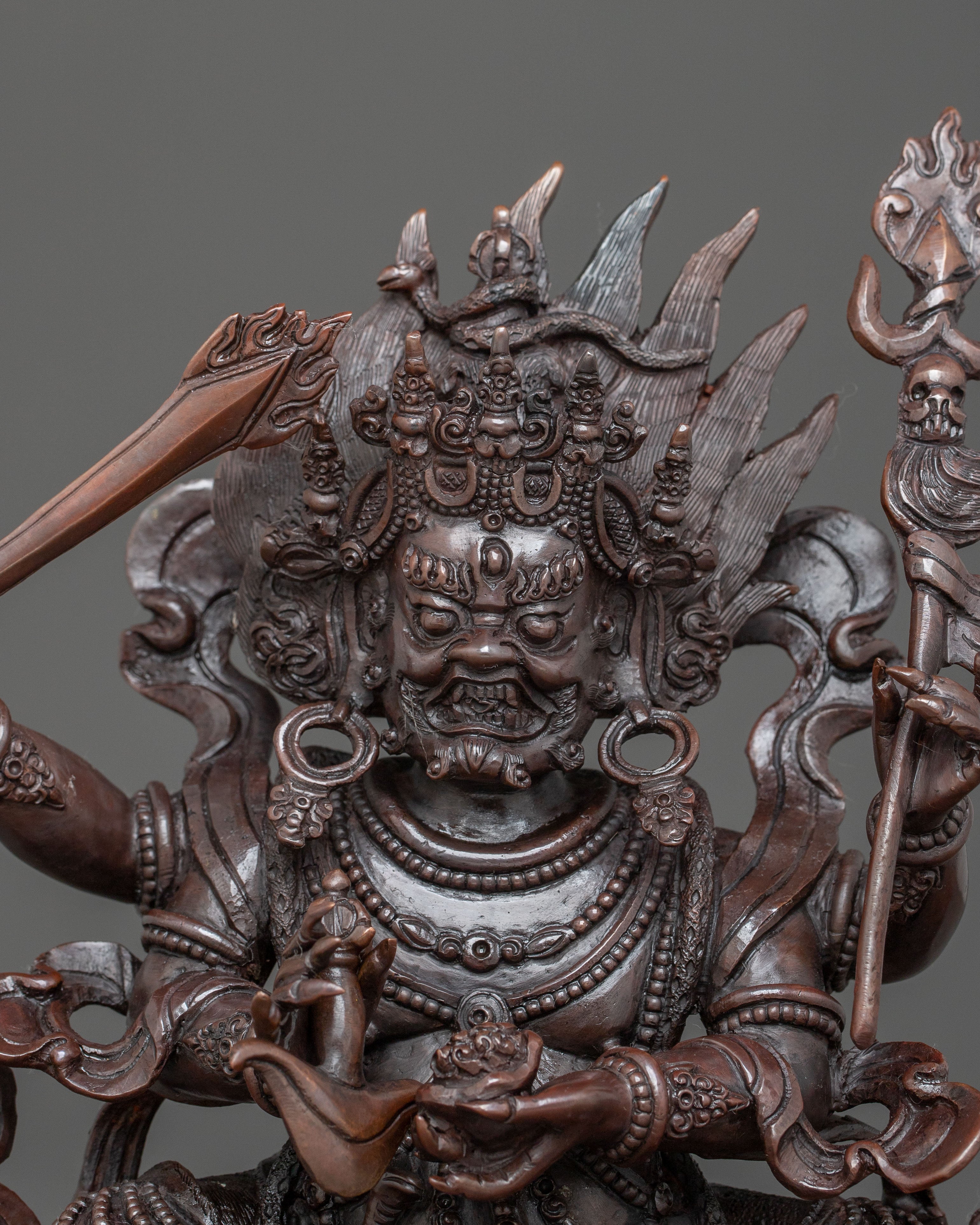 Four Armed Mahakala Statue in Oxidized Copper