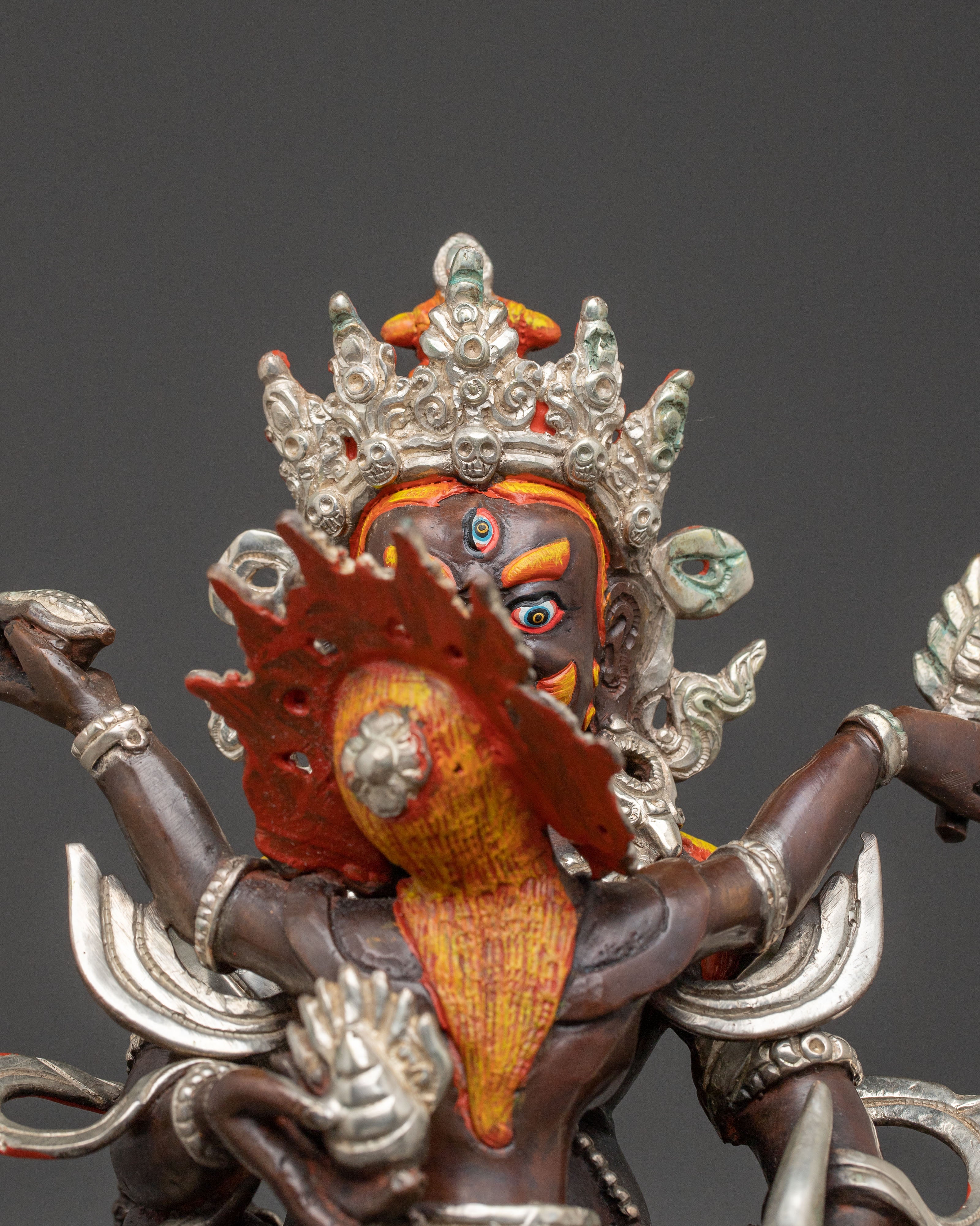 Handcrafted Statue of Red Dzambhala: Oxidized Copper Form
