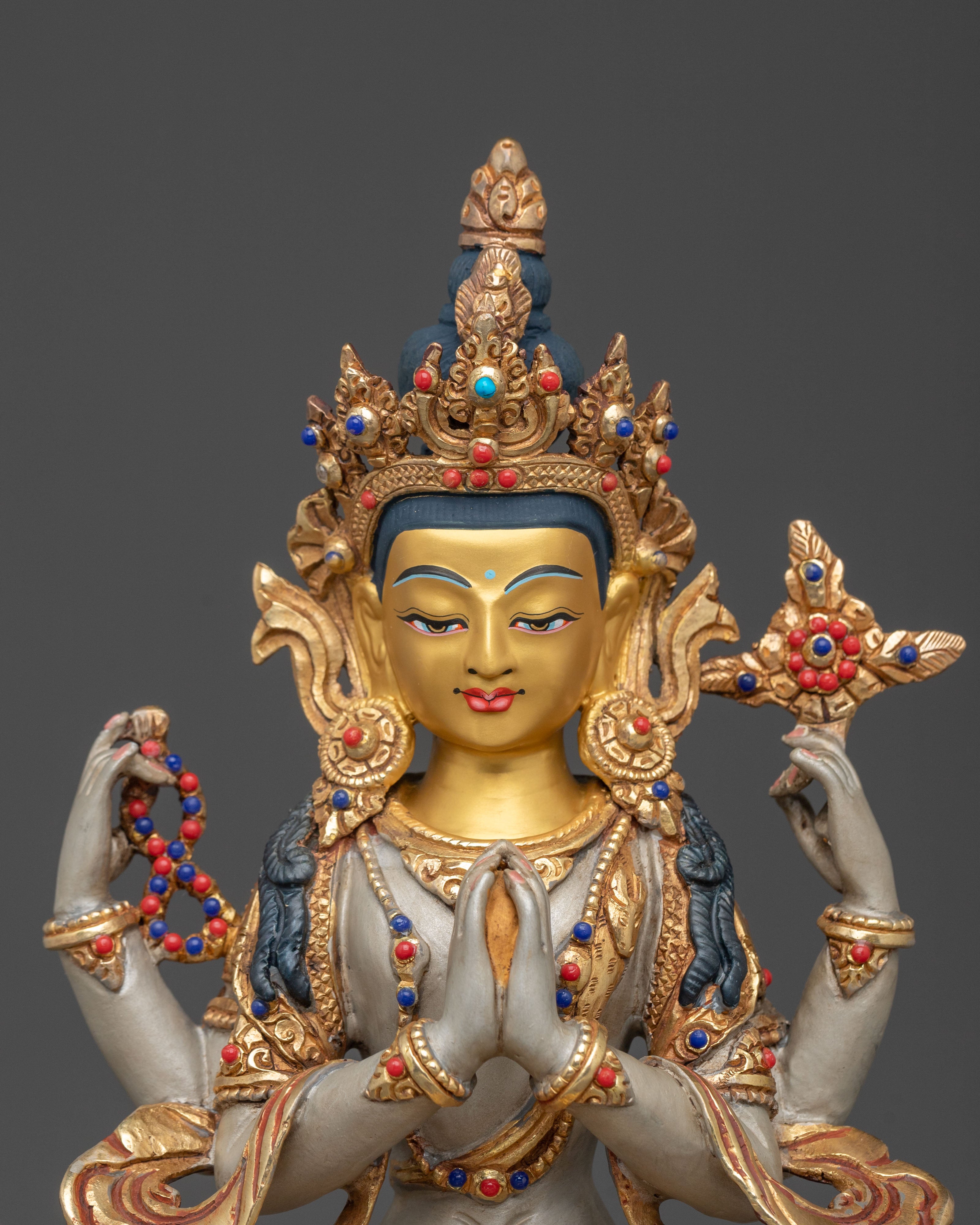 Hand Carved Four Armed Chenrezig Sculpture: Embodiment of Compassion