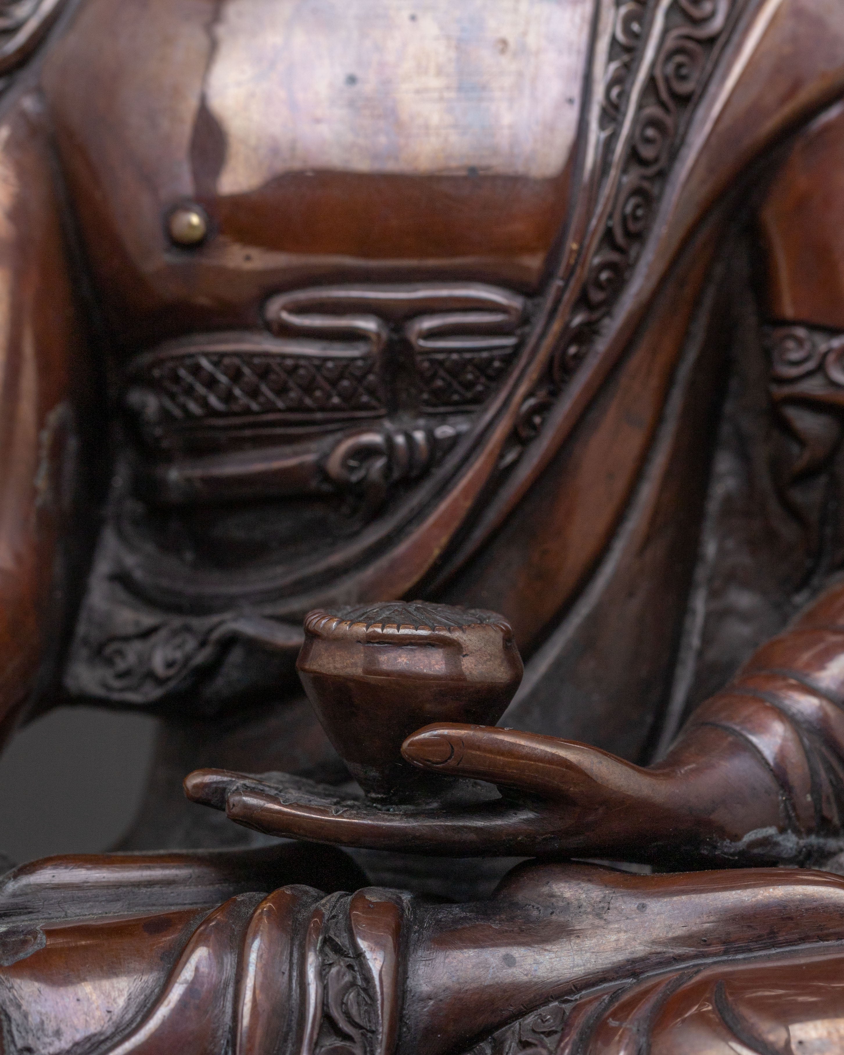 A Serene Oxidized Copper Statue of the Historical Shakyamuni Buddha