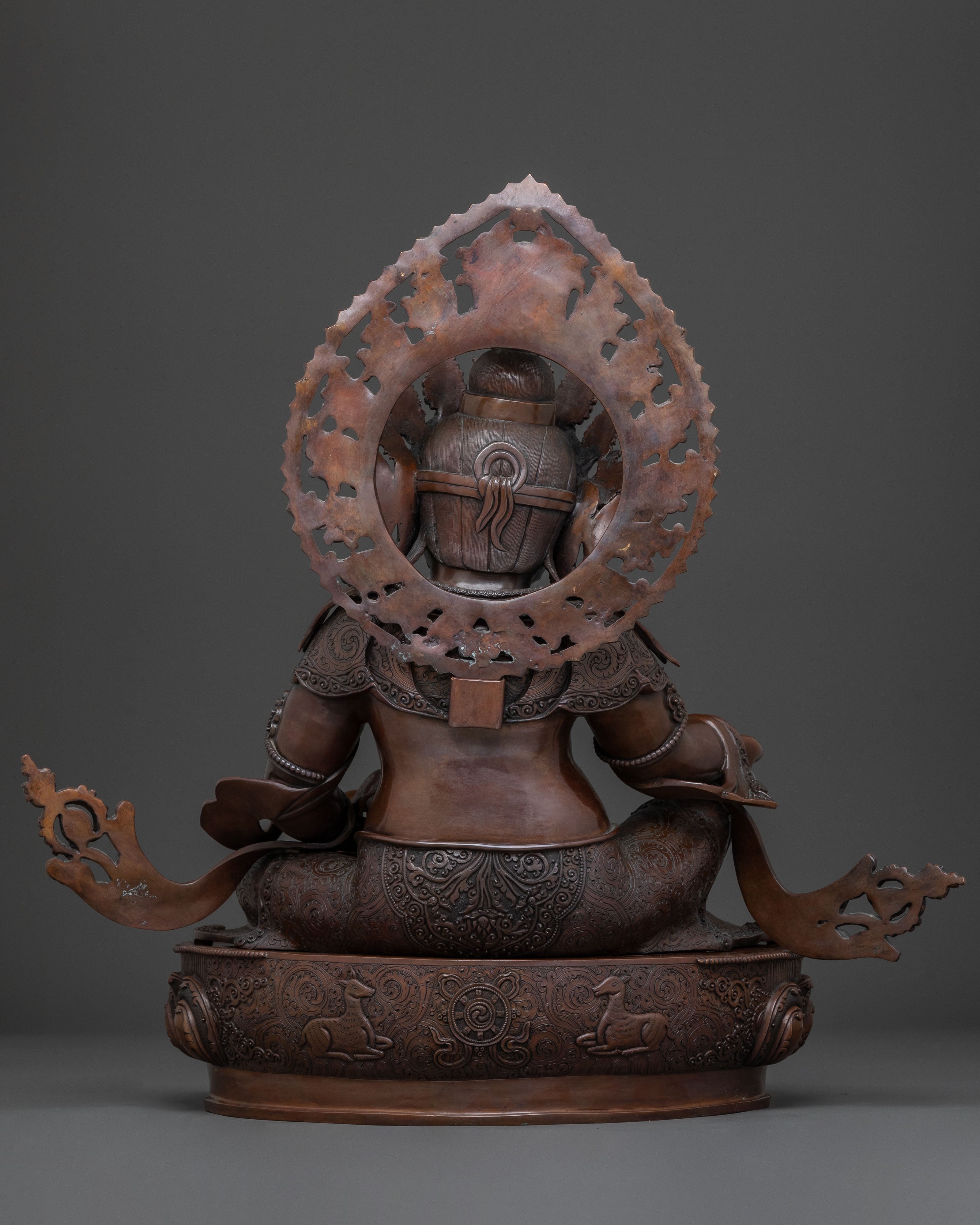 Deity of Wealth: Dzambhala Oxidized Copper Statue