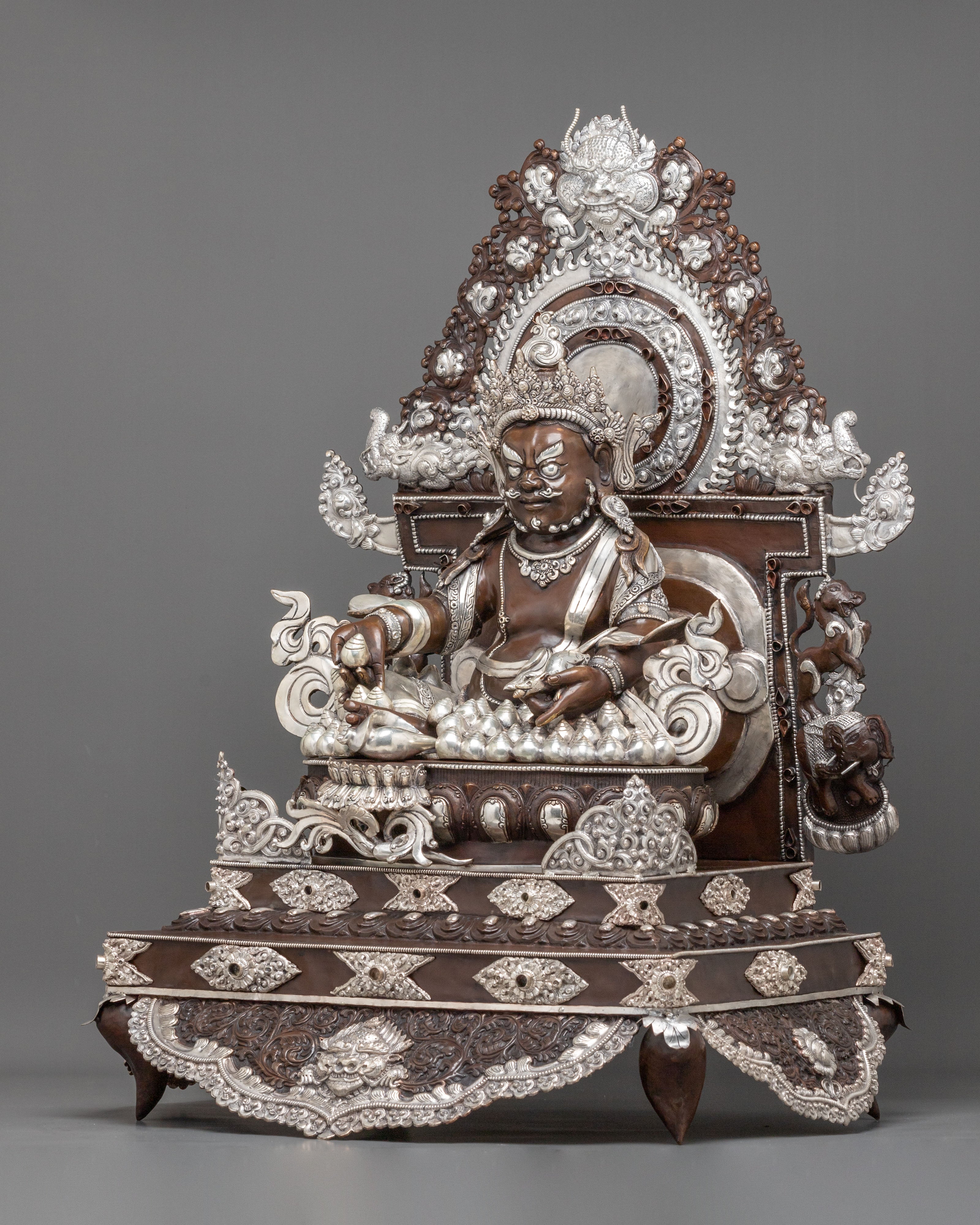 Dzambhala Statue on Throne | Oxidized Copper Figurine with Silver Plating