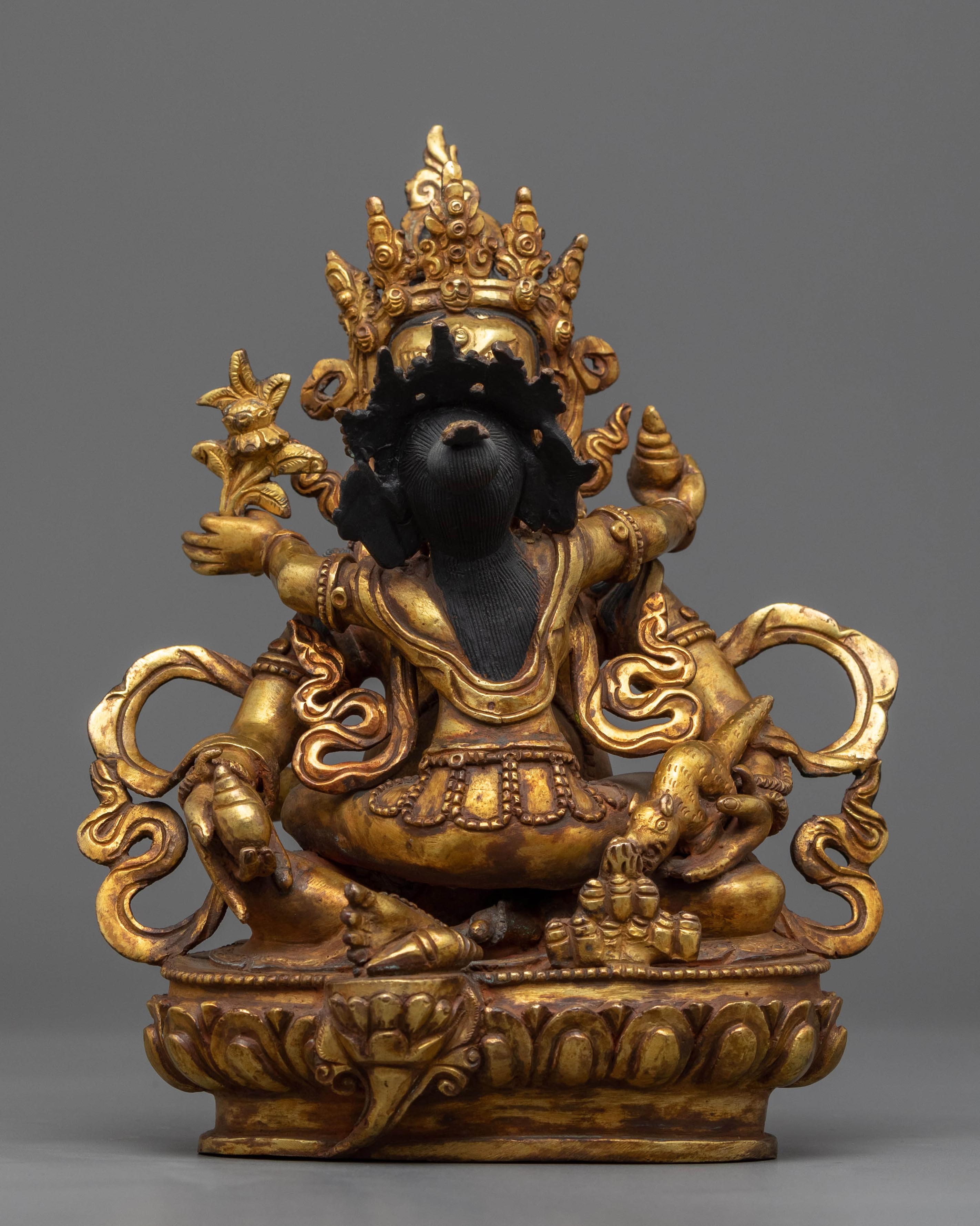 Dzambhala With Consort Practicing yab yum pose.