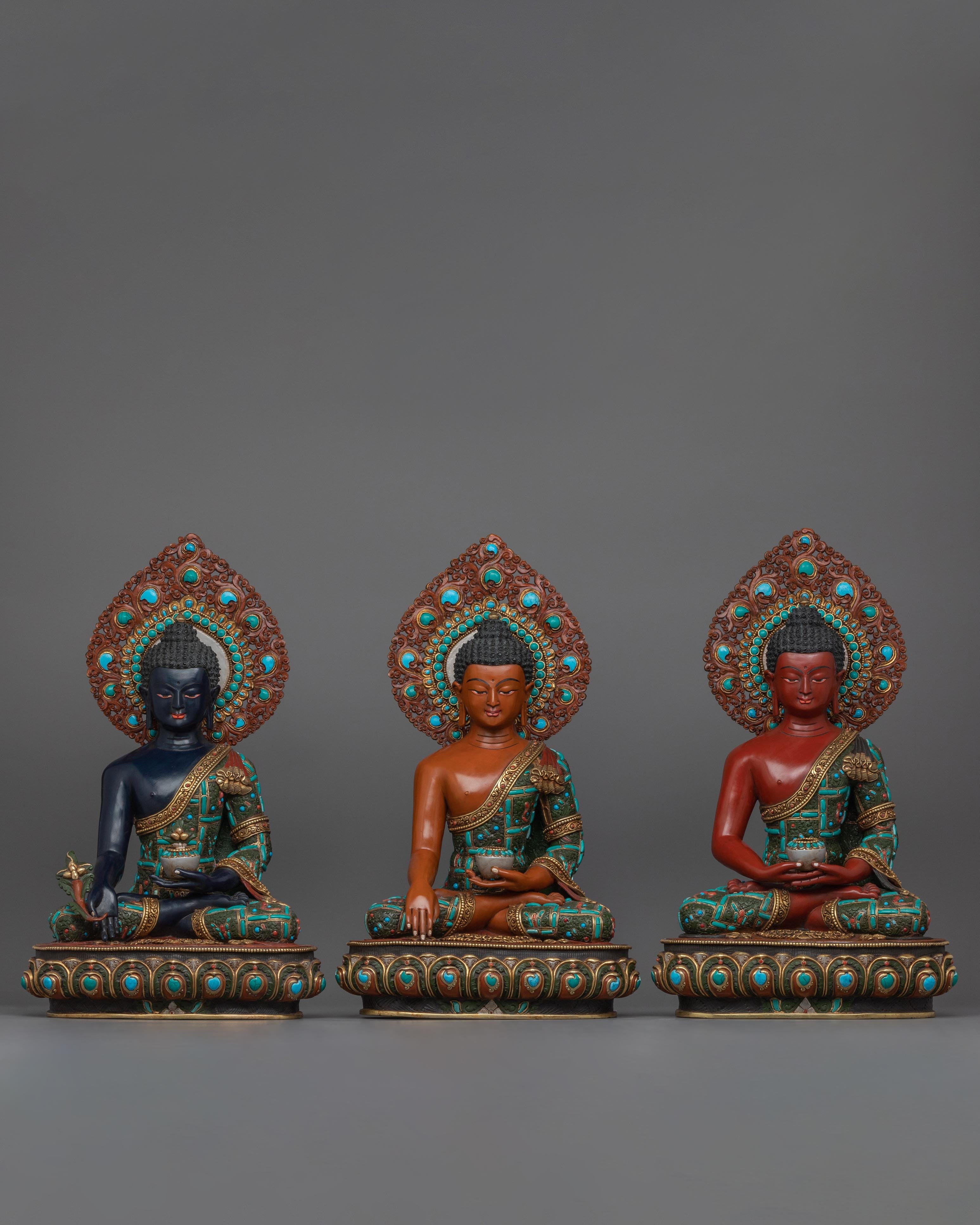 three buddha statues