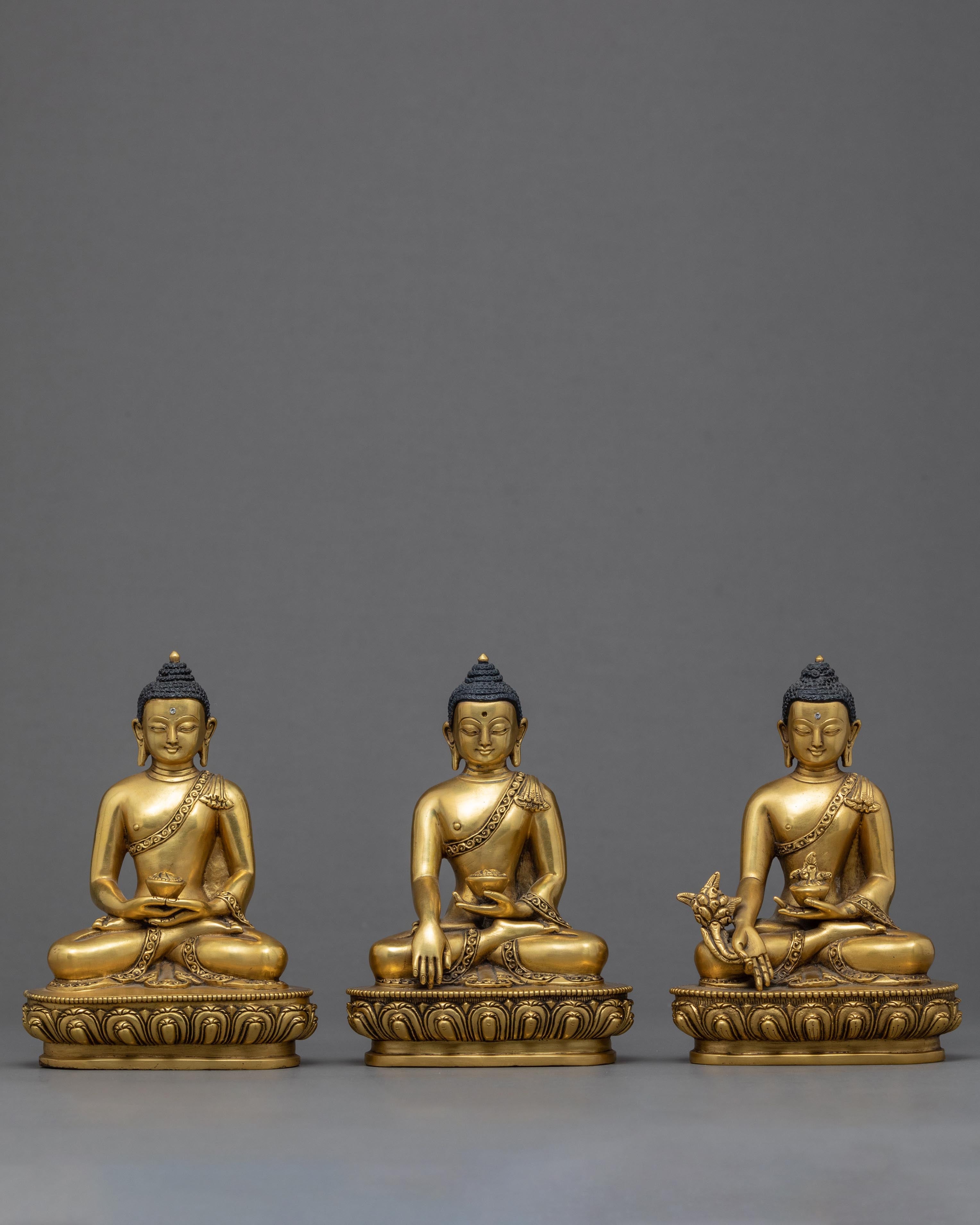 Three Buddha Statues