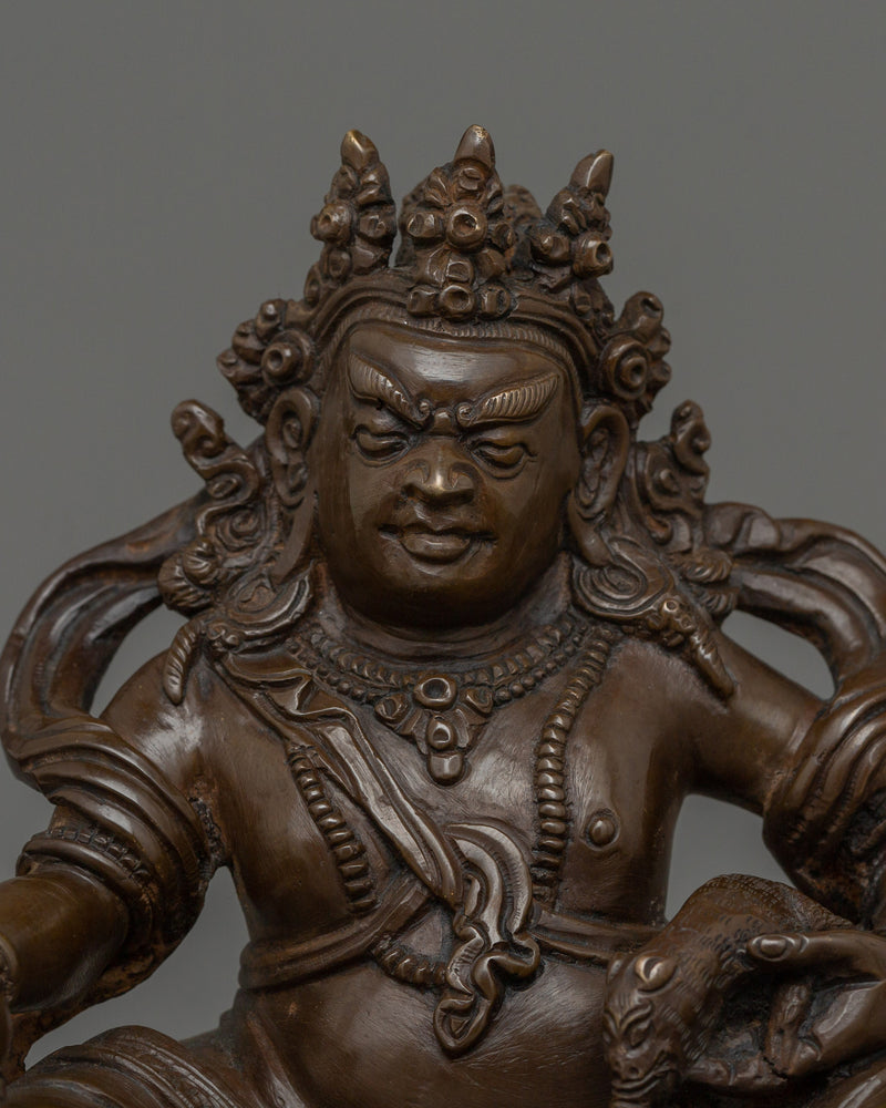 Sacred sculpture of Dzambhala | The Wealth Deity of Tibetan Buddhism