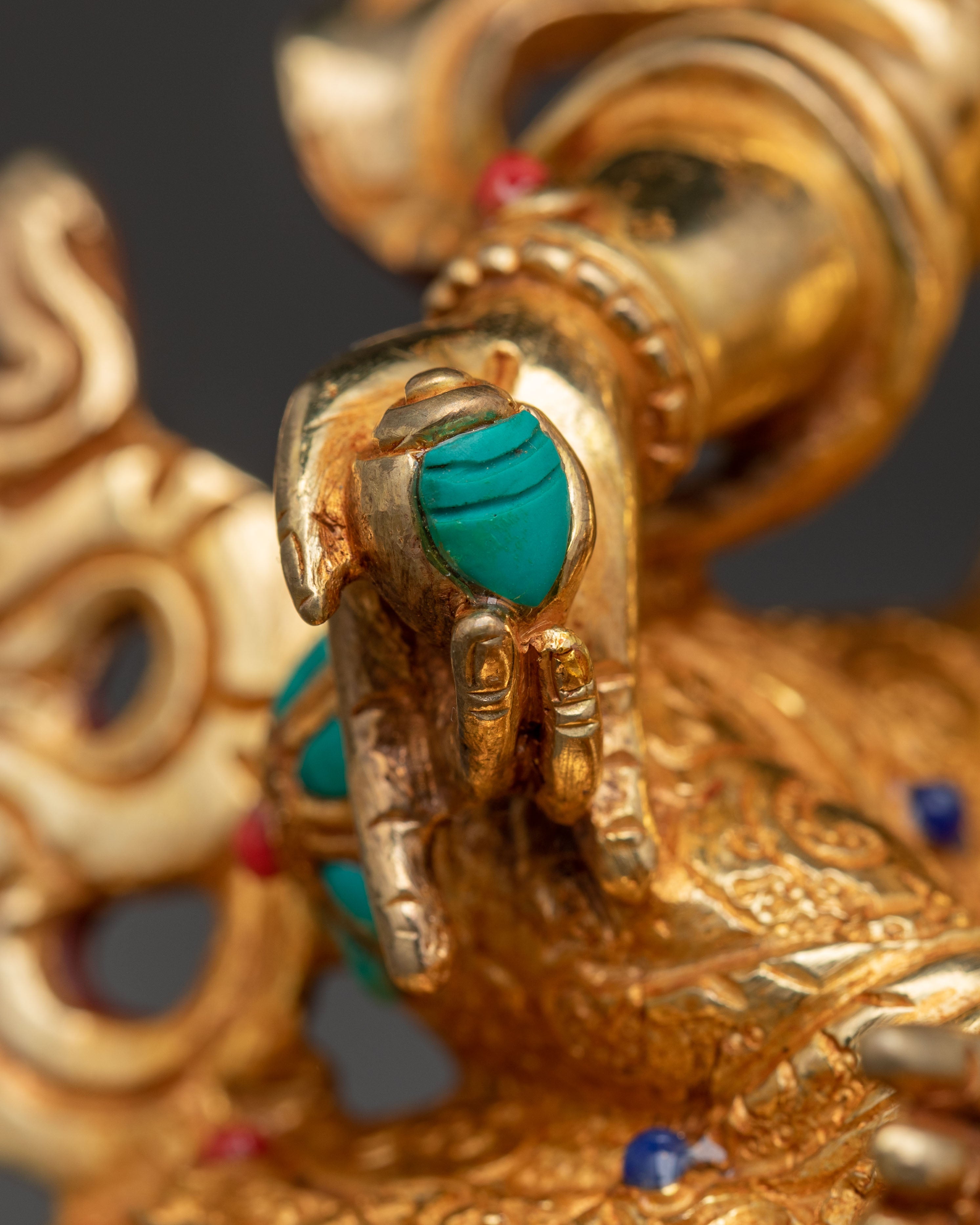 Statue of Dzambhala: Buddhist Wealth Icon