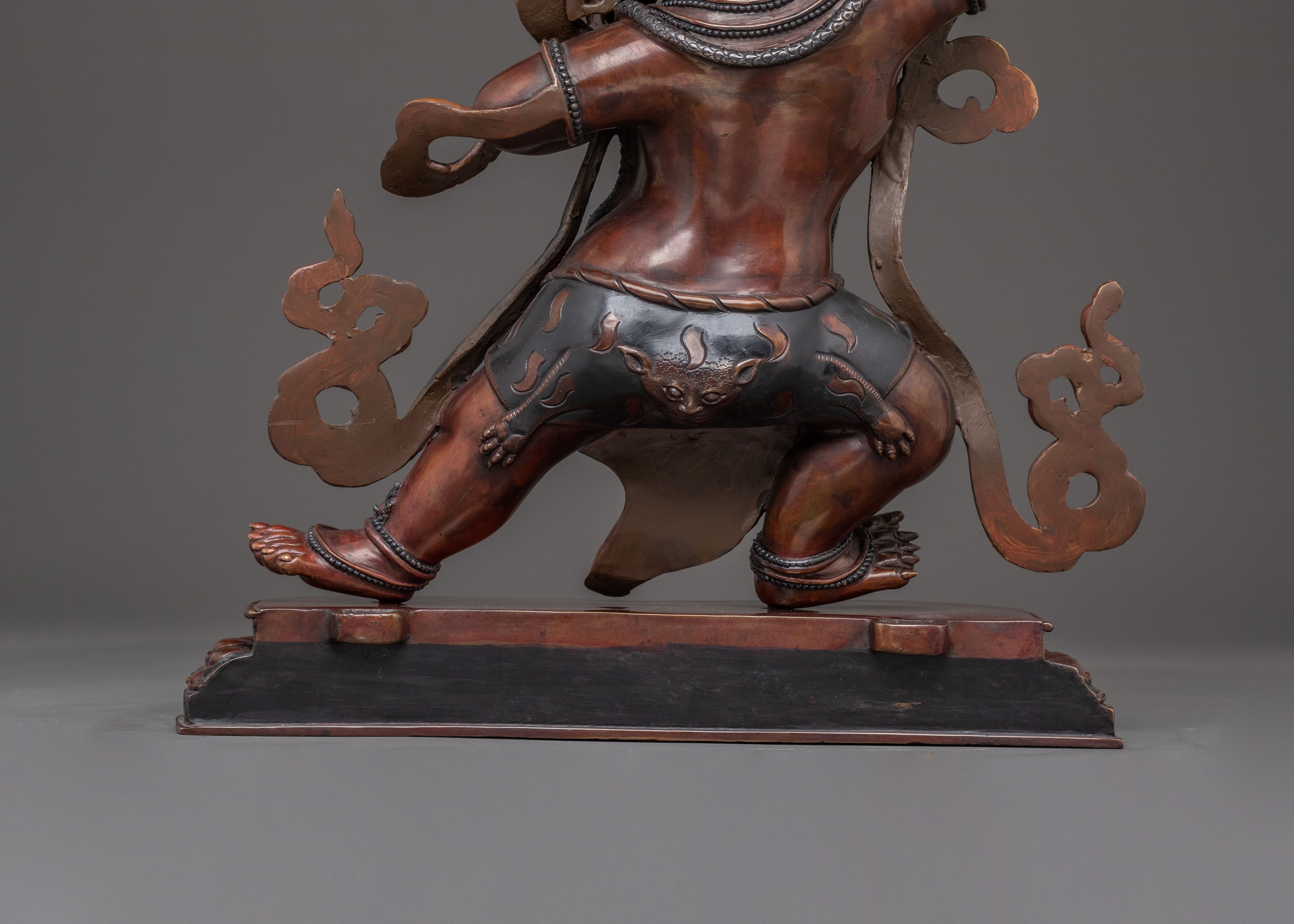 Vajrapani's Dynamic Presence: Divine Statue of Vajrapani in Oxidized Copper