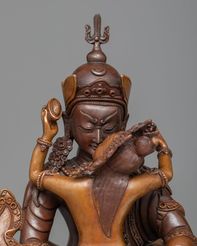 guru rinpoche with consort sculpture