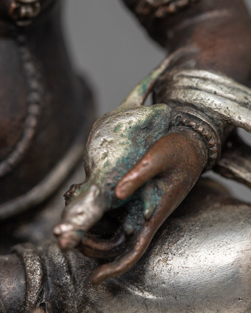 Miniature Dzambhala Statue | Silver-Plated Symbol of Prosperity