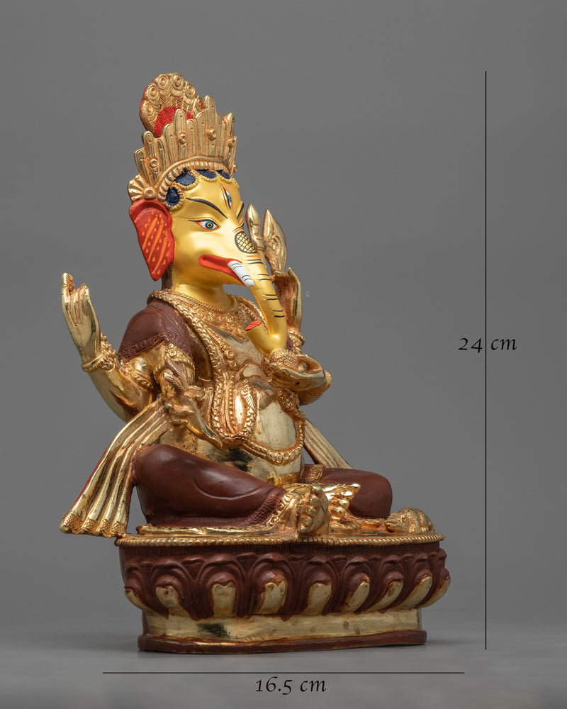 4 arm ganesha-sculpture