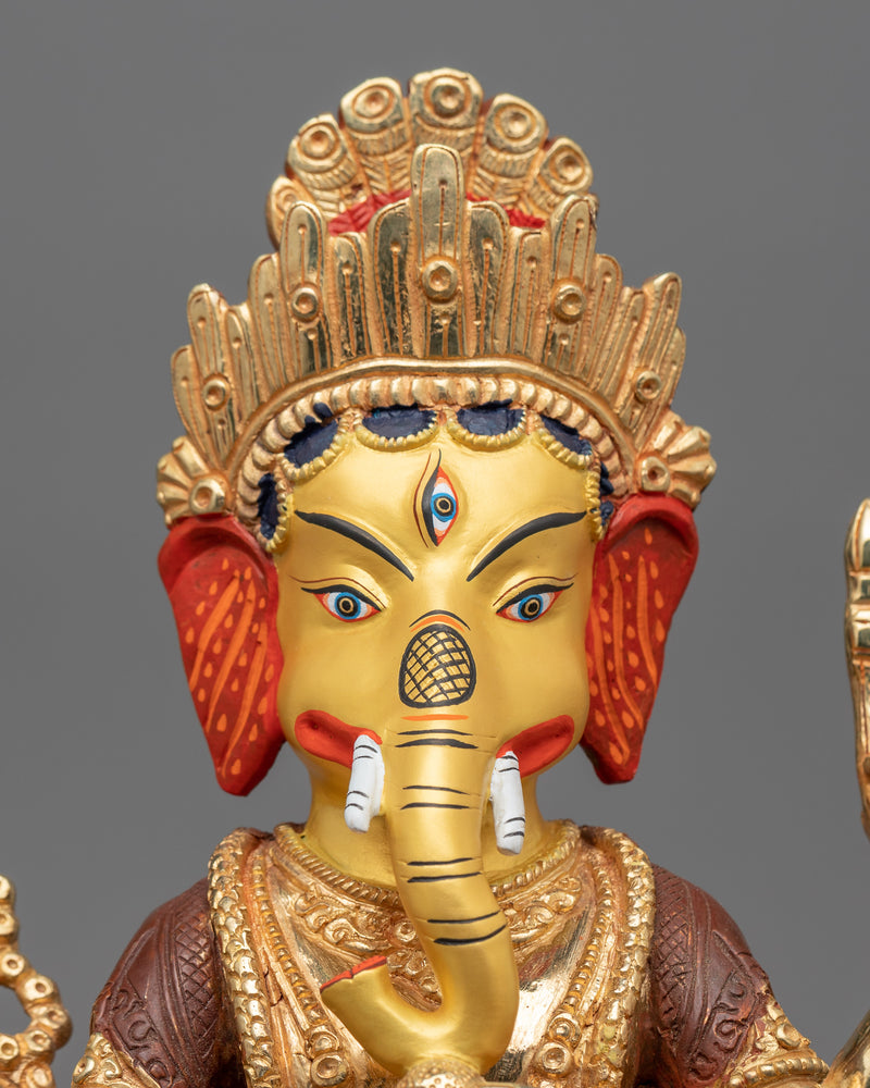 4 arm ganesha-sculpture