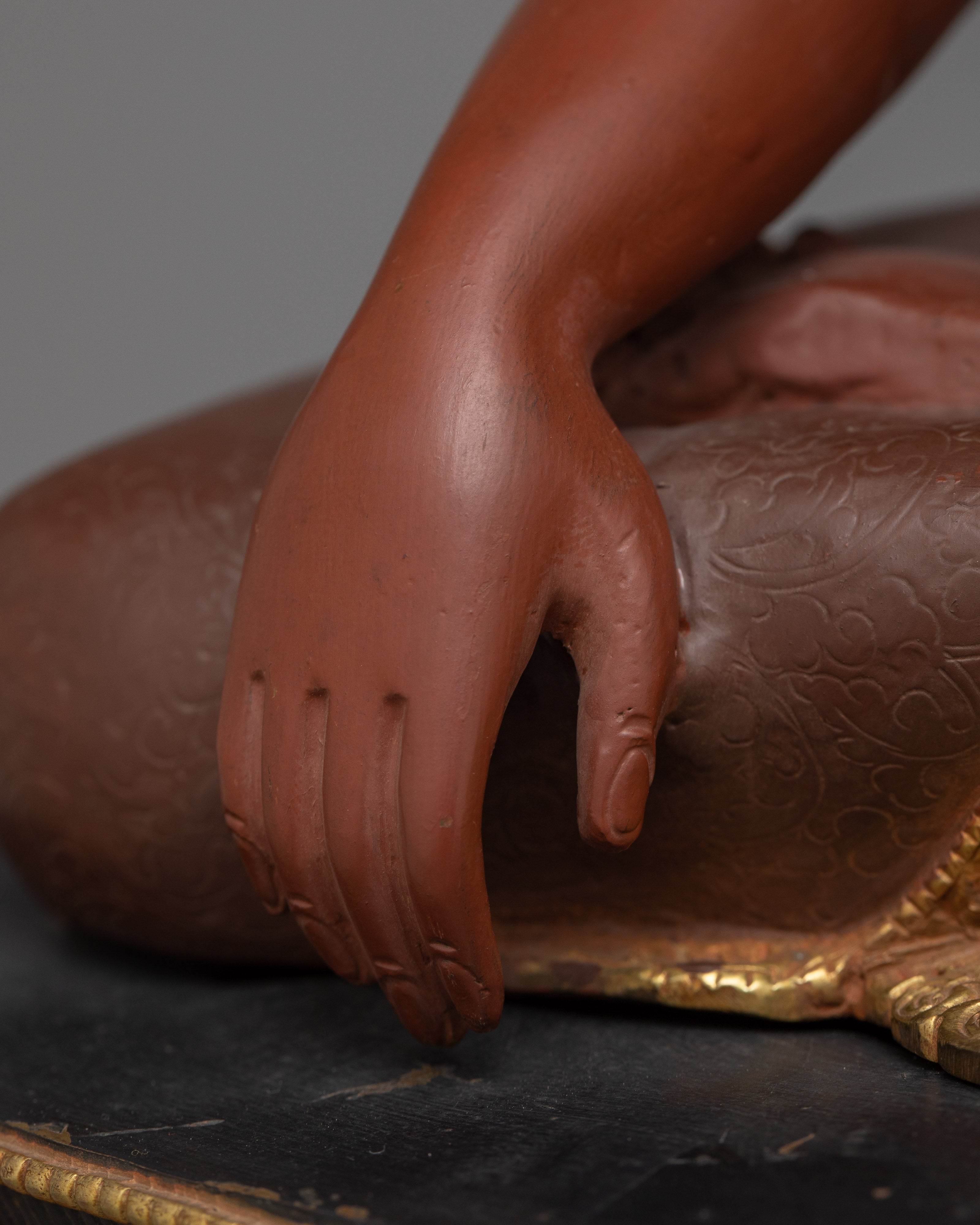 Shakyamuni Buddha Reddish Colored Statue | Embodiment of Tranquility and Enlightenment