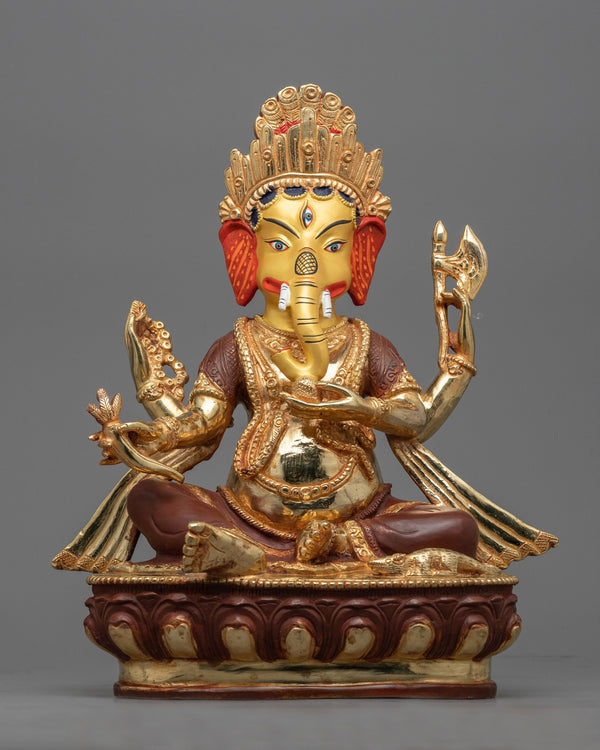 4 arm ganesha-sculpture