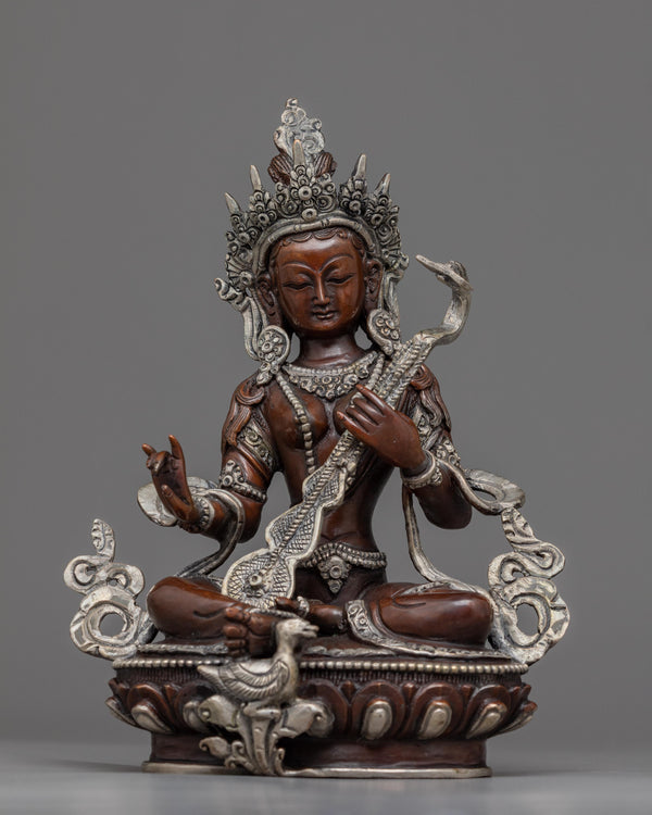 saraswati with instrument statue