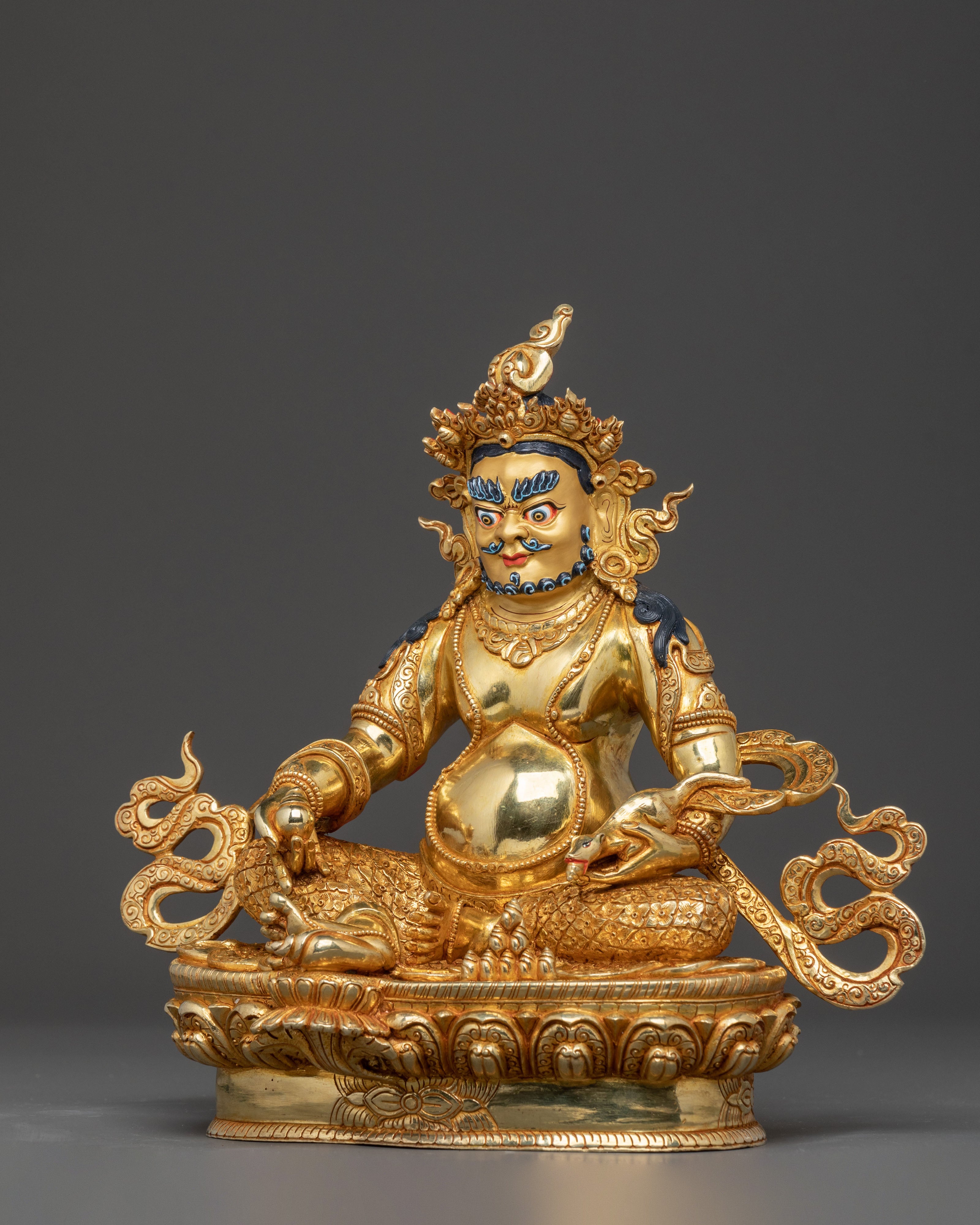 Golden Dzambhala Statue: Embodiment of Generosity