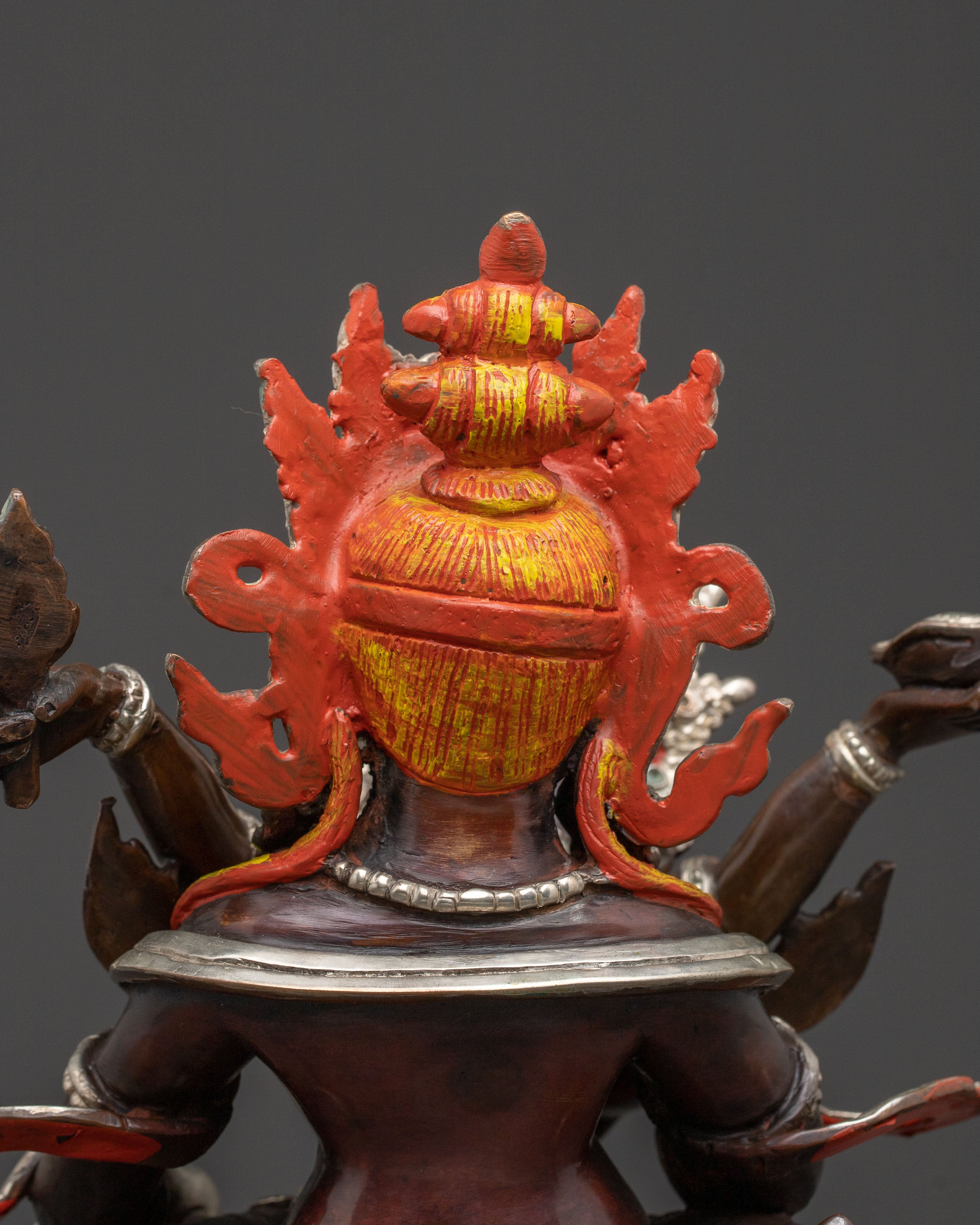 Handcrafted Statue of Red Dzambhala: Oxidized Copper Form