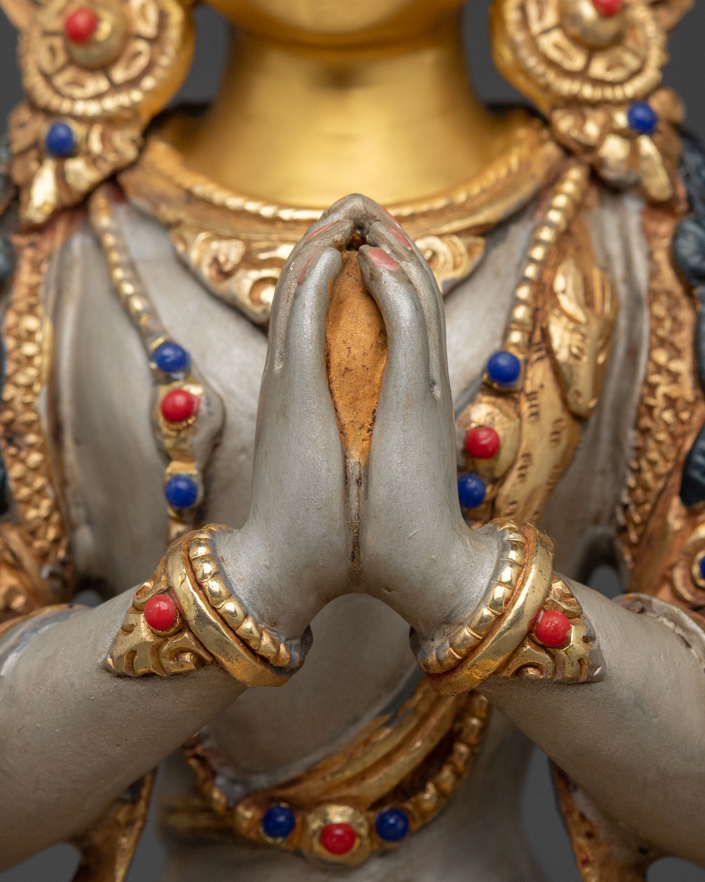 Hand Carved Four Armed Chenrezig Sculpture: Embodiment of Compassion