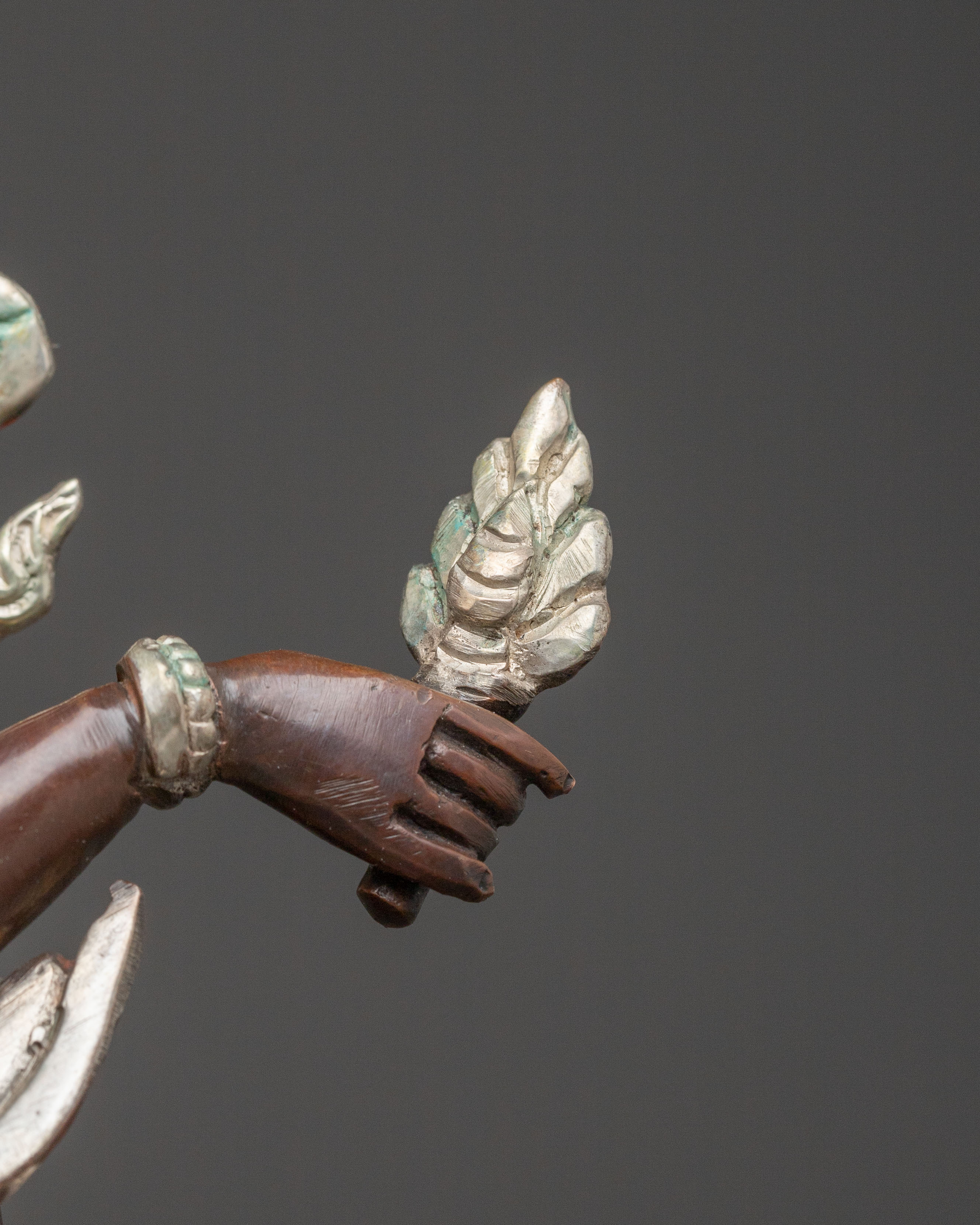 Handcrafted Statue of Red Dzambhala: Oxidized Copper Form