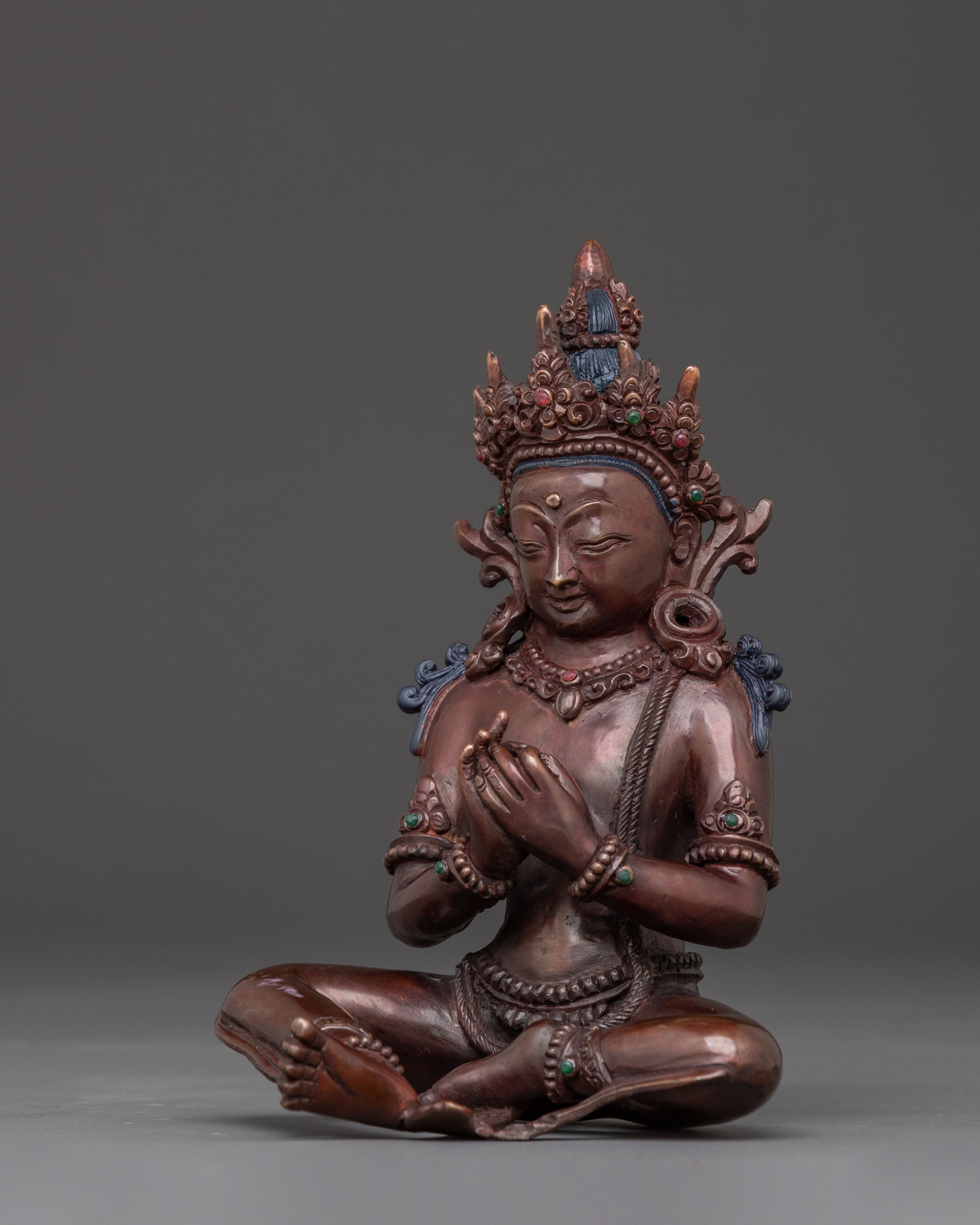 A tranquil Buddha Vairocana Copper Statue | Oxidized Finish