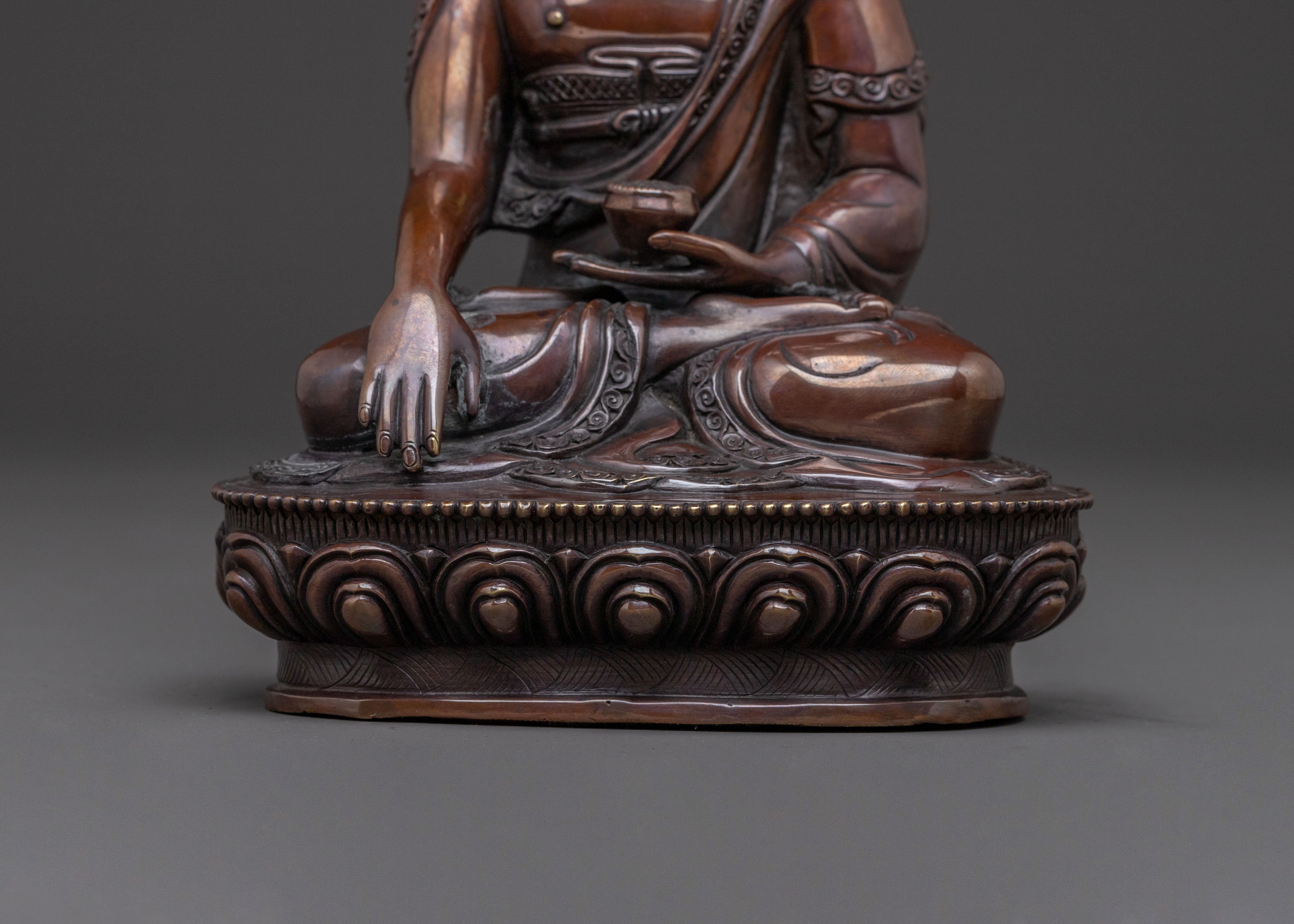 A Serene Oxidized Copper Statue of the Historical Shakyamuni Buddha