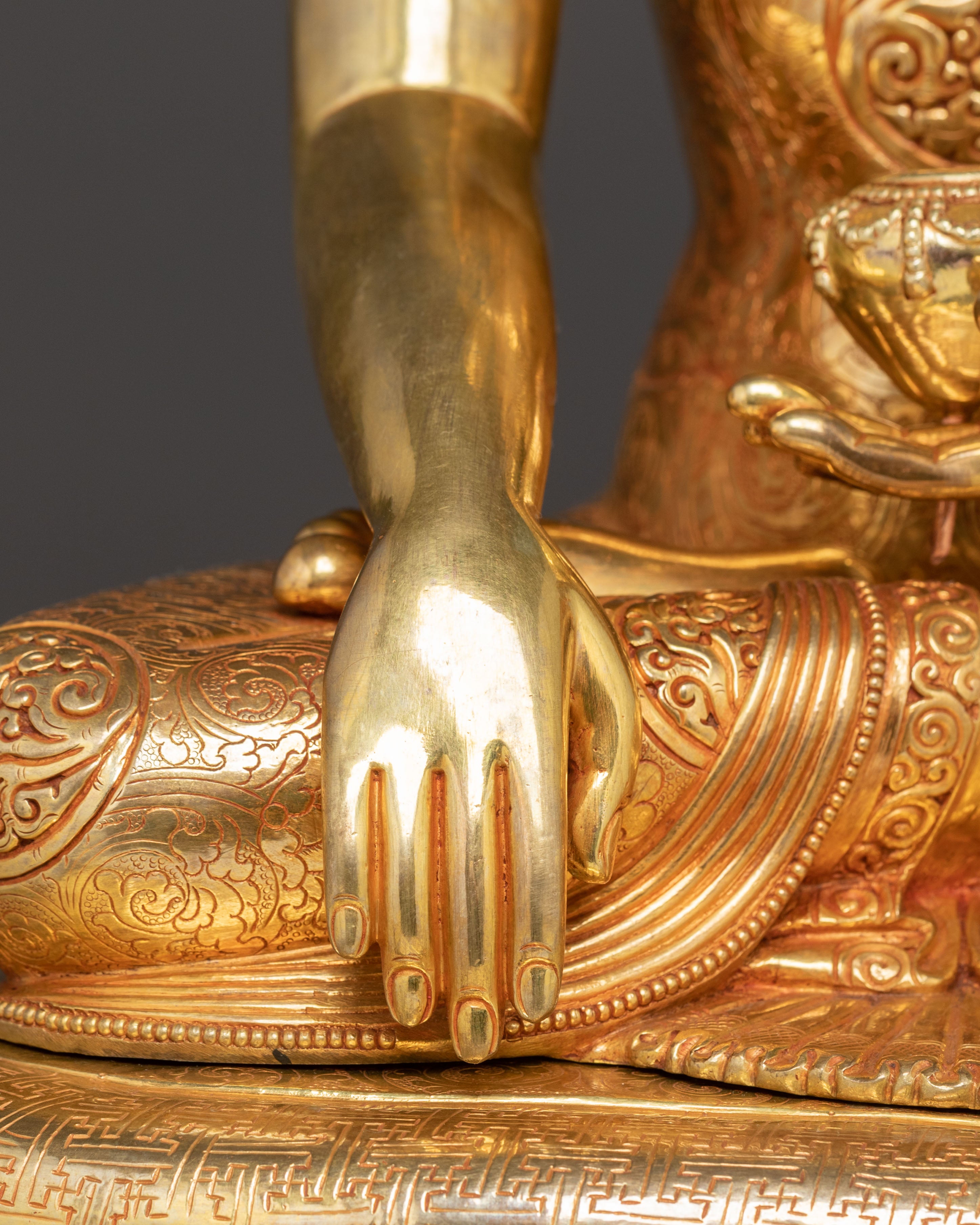 Sacred Statue of Shakyamuni Buddha in Throne – 24K Gold Gilded Artistry