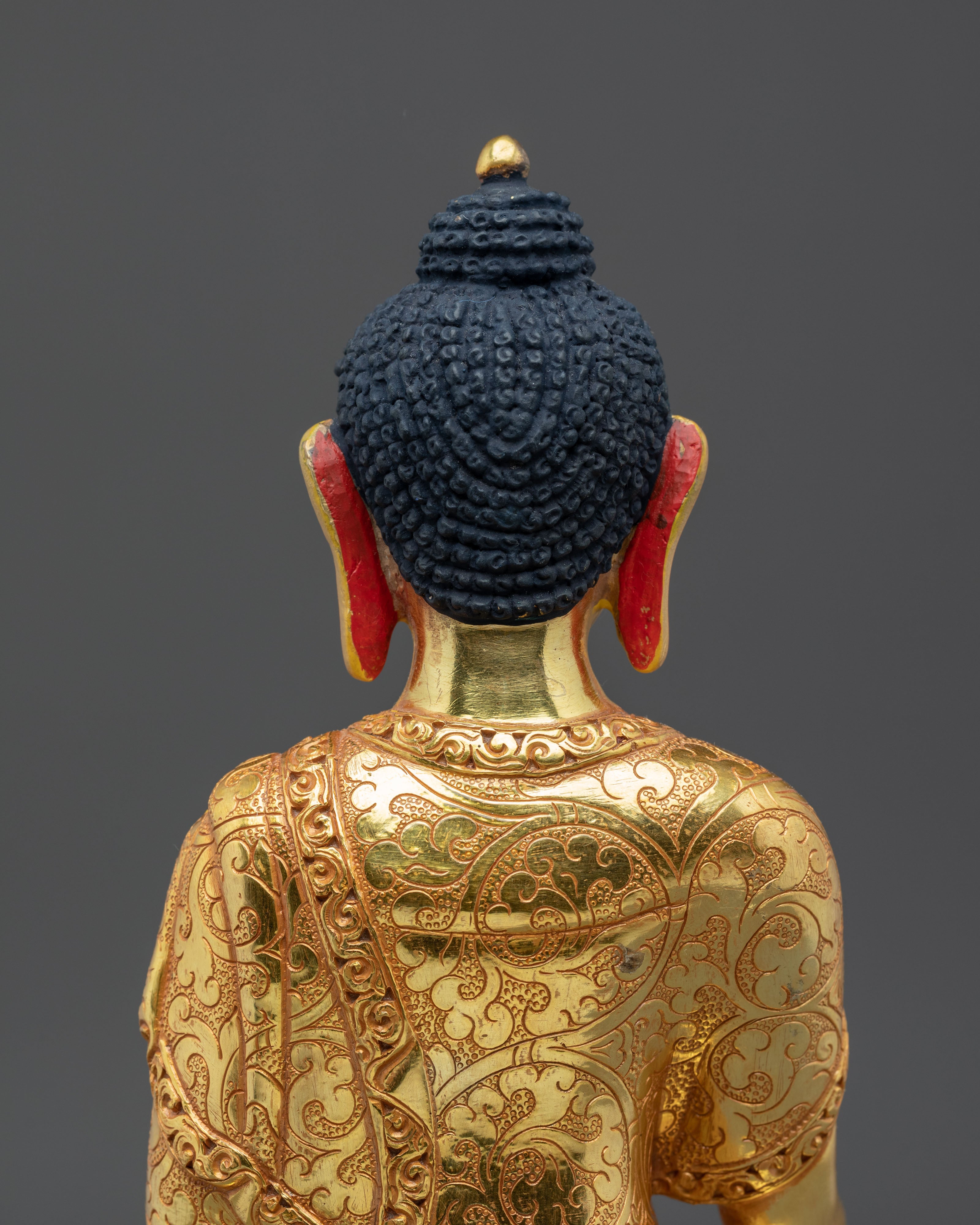 Mitrugpa Golden Figurine: Serene Radiance