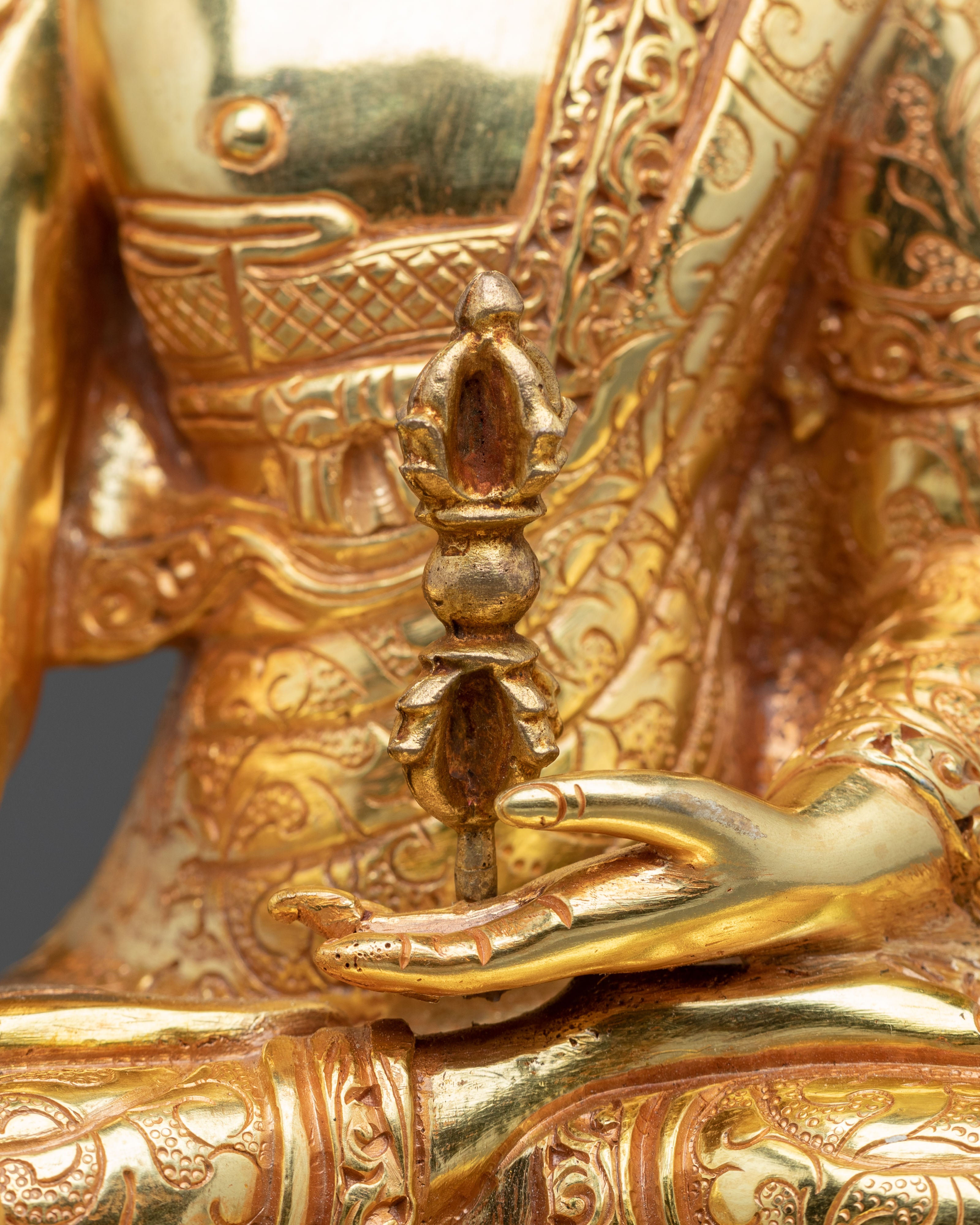 Mitrugpa Golden Figurine: Serene Radiance