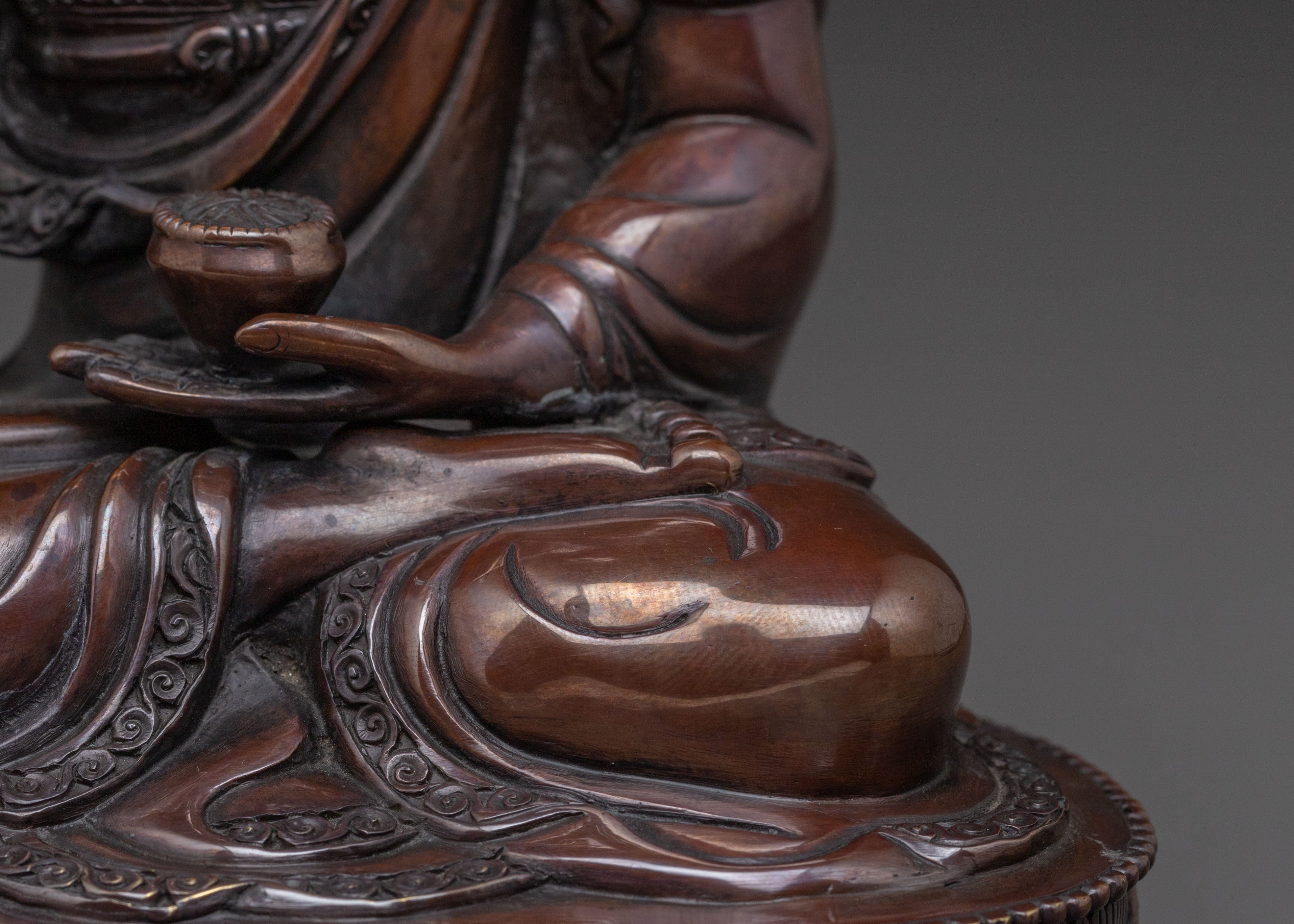 A Serene Oxidized Copper Statue of the Historical Shakyamuni Buddha