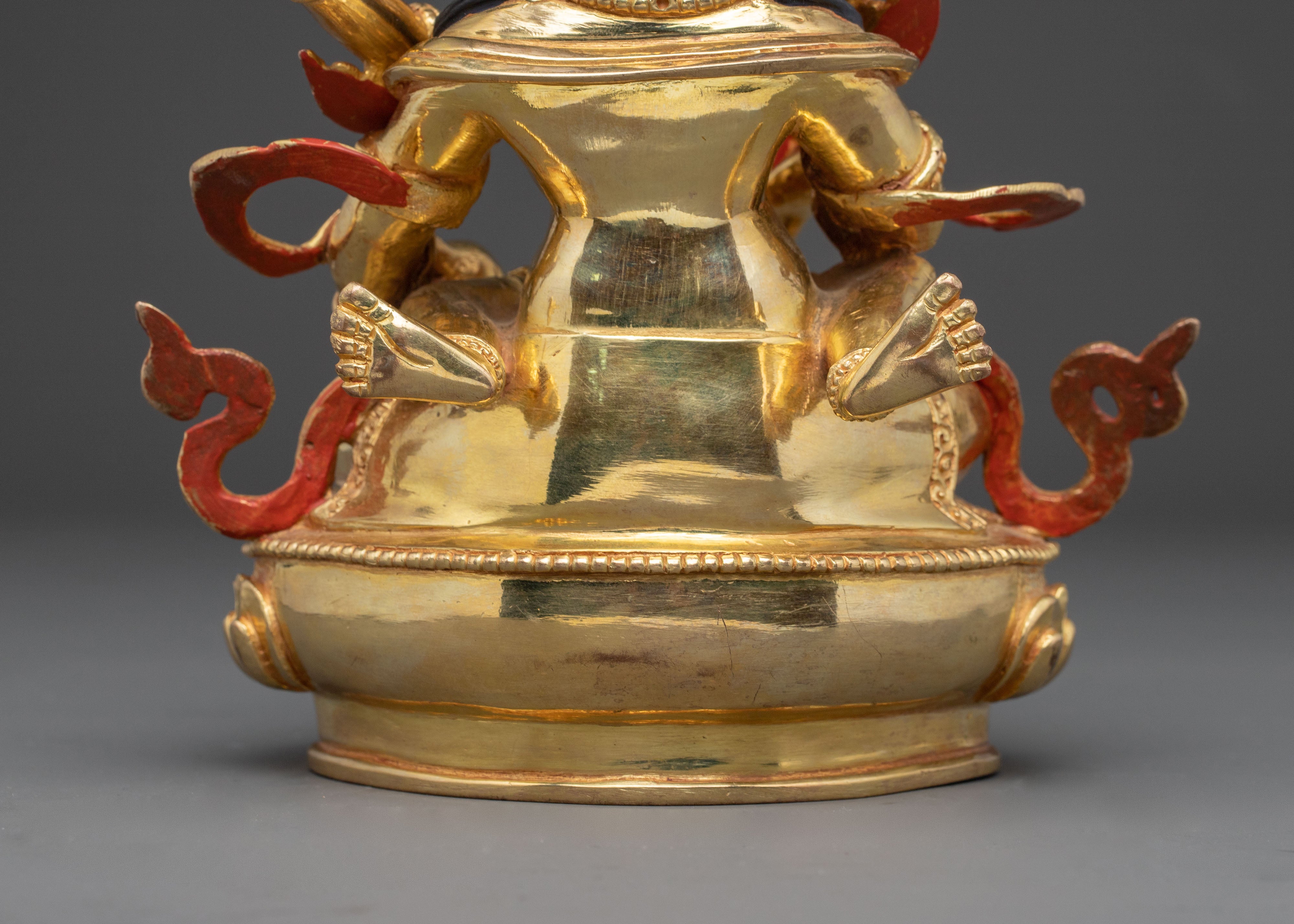 Handcrafted Statue of Red Dzambhala: Tibetan Wealth Deity,