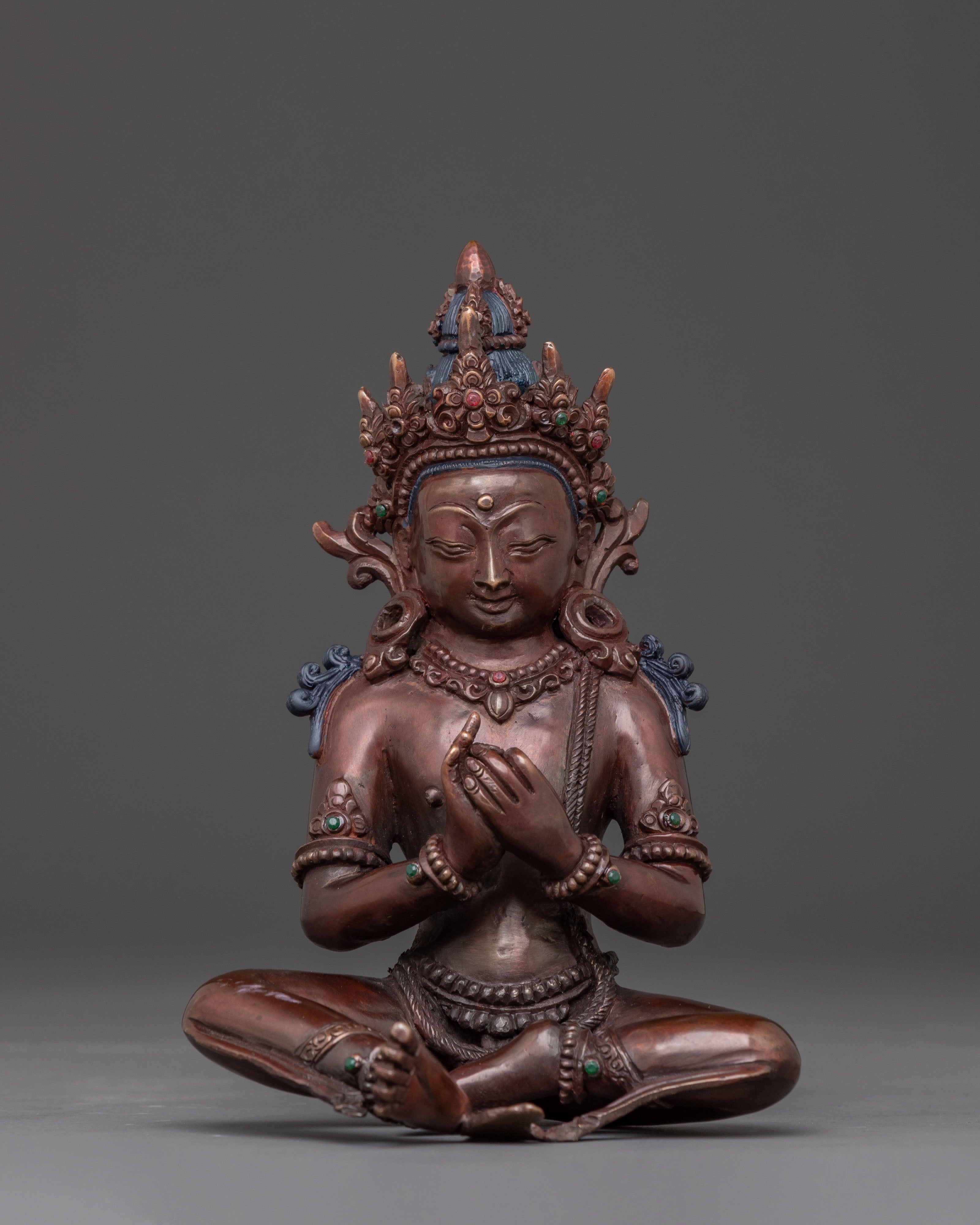 A tranquil Buddha Vairocana Copper Statue | Oxidized Finish