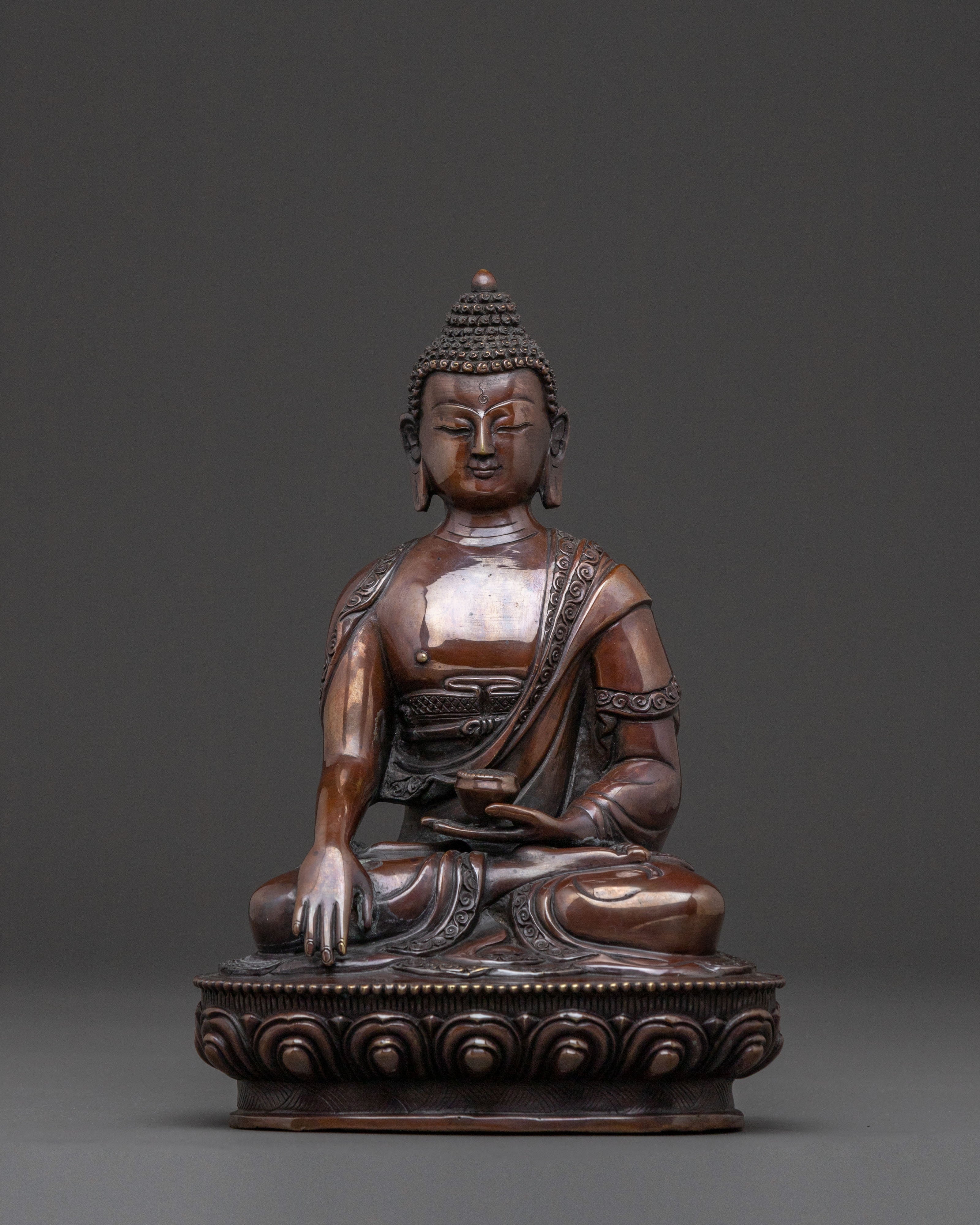 A Serene Oxidized Copper Statue of the Historical Shakyamuni Buddha