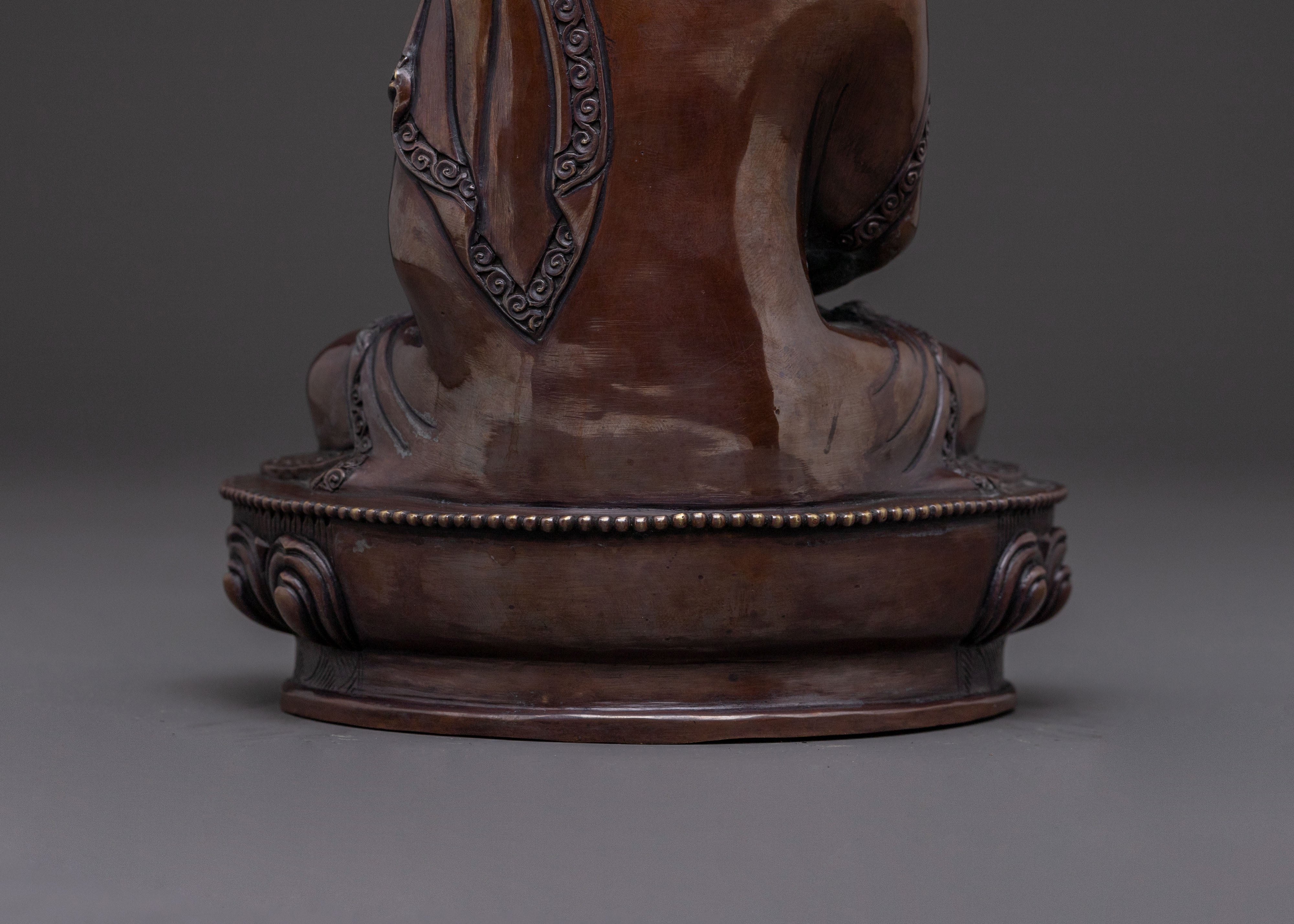 Amitabha Buddha: Handcrafted Golden Statue in Oxidized Copper