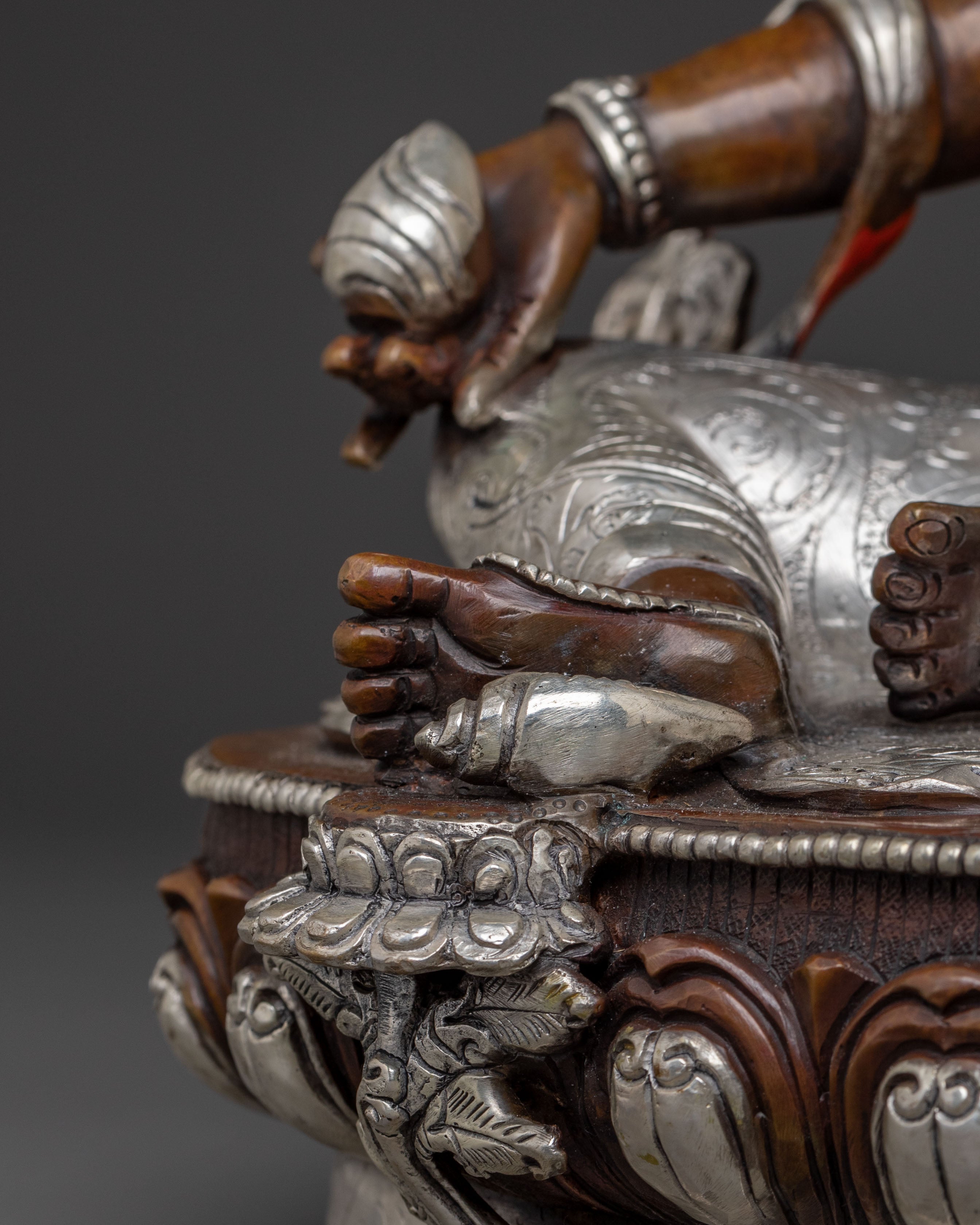 Dzambhala Copper Handcrafted Statue with Silver Accents