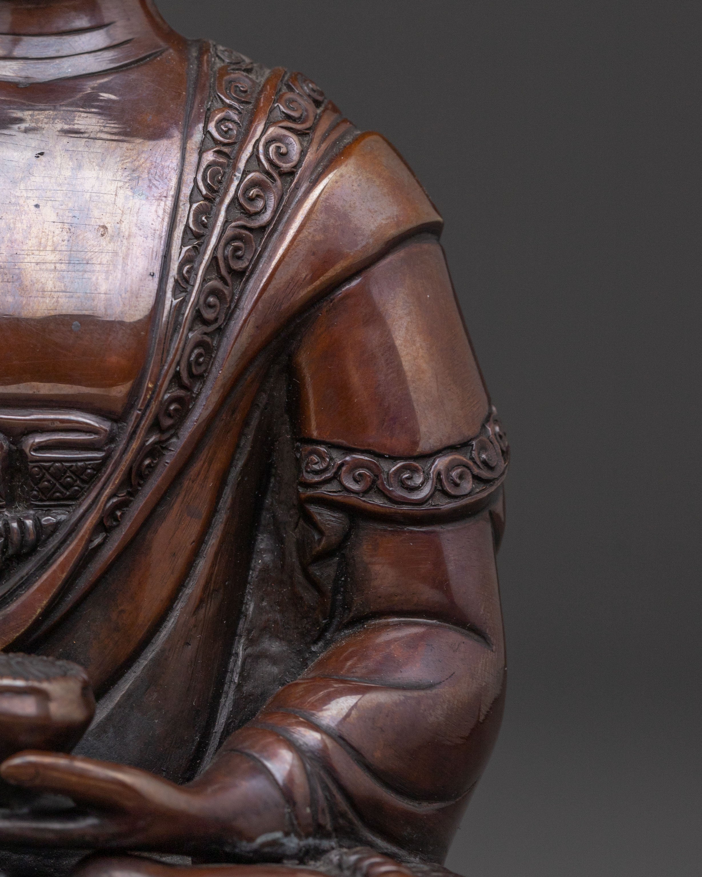 A Serene Oxidized Copper Statue of the Historical Shakyamuni Buddha