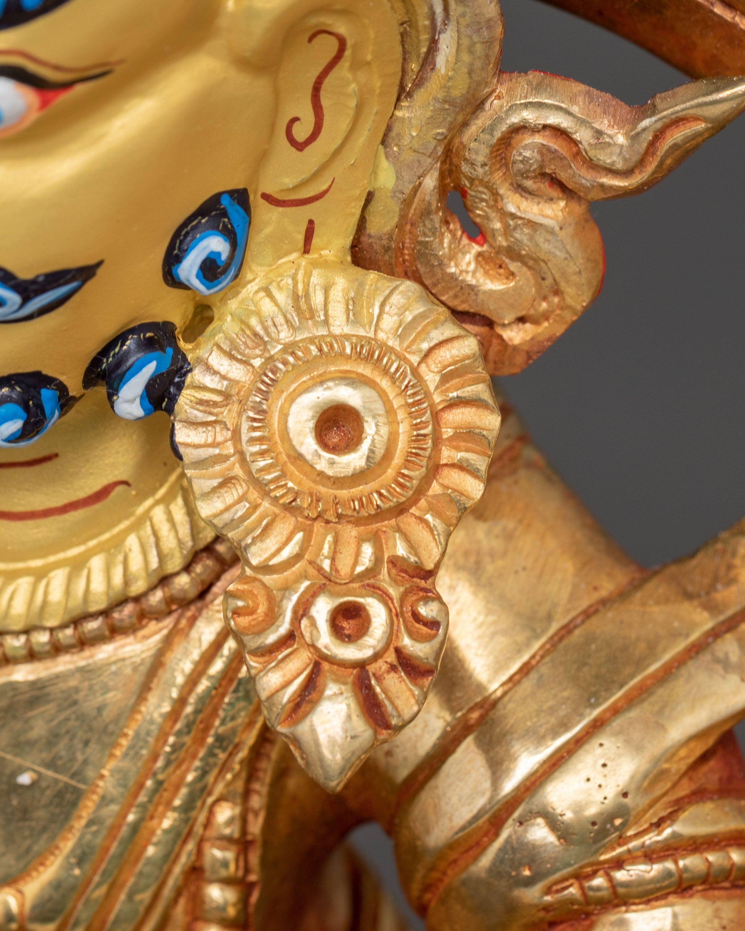 Golden Namtoshe Statue: Guardian of the North