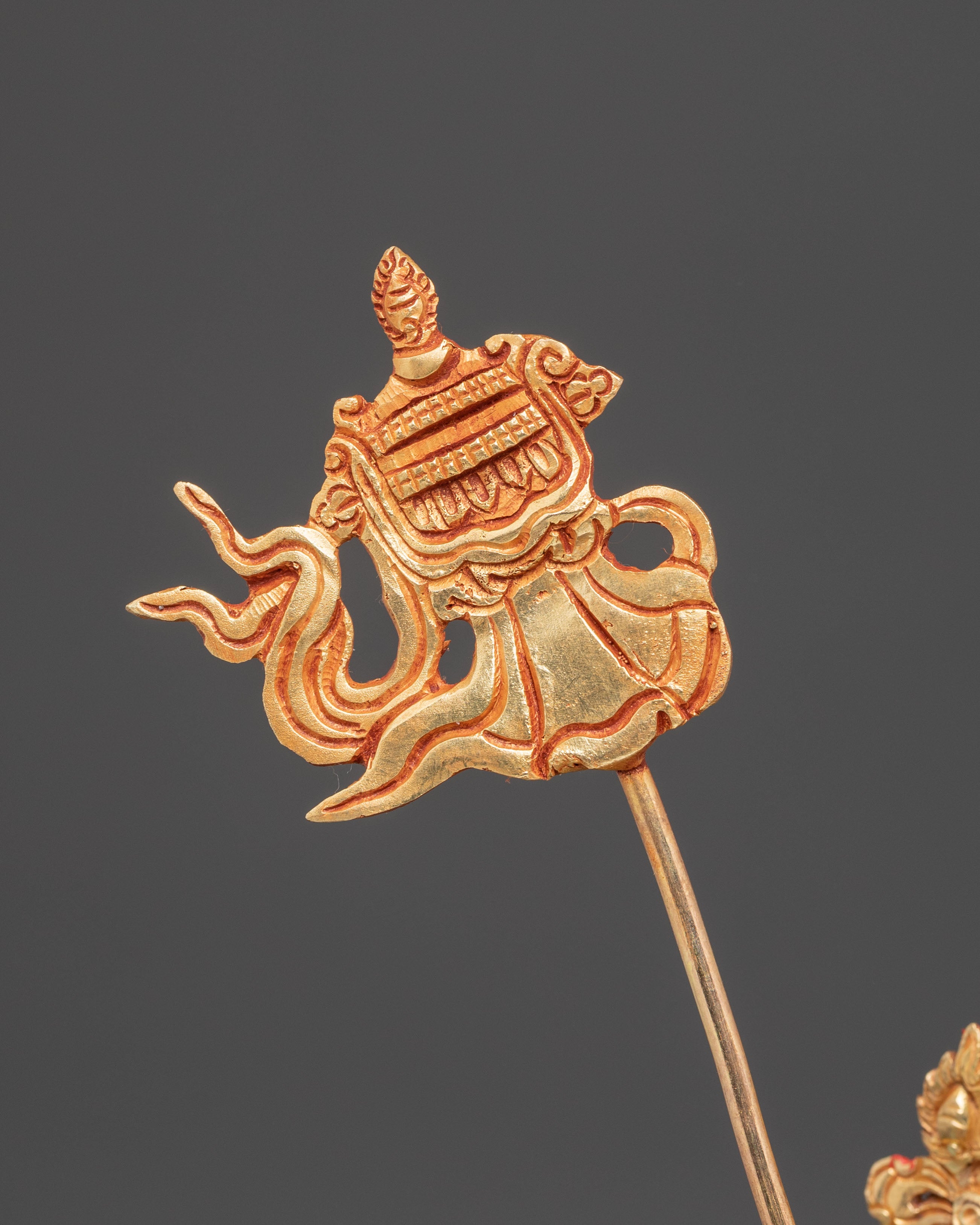 Golden Namtoshe Statue: Guardian of the North