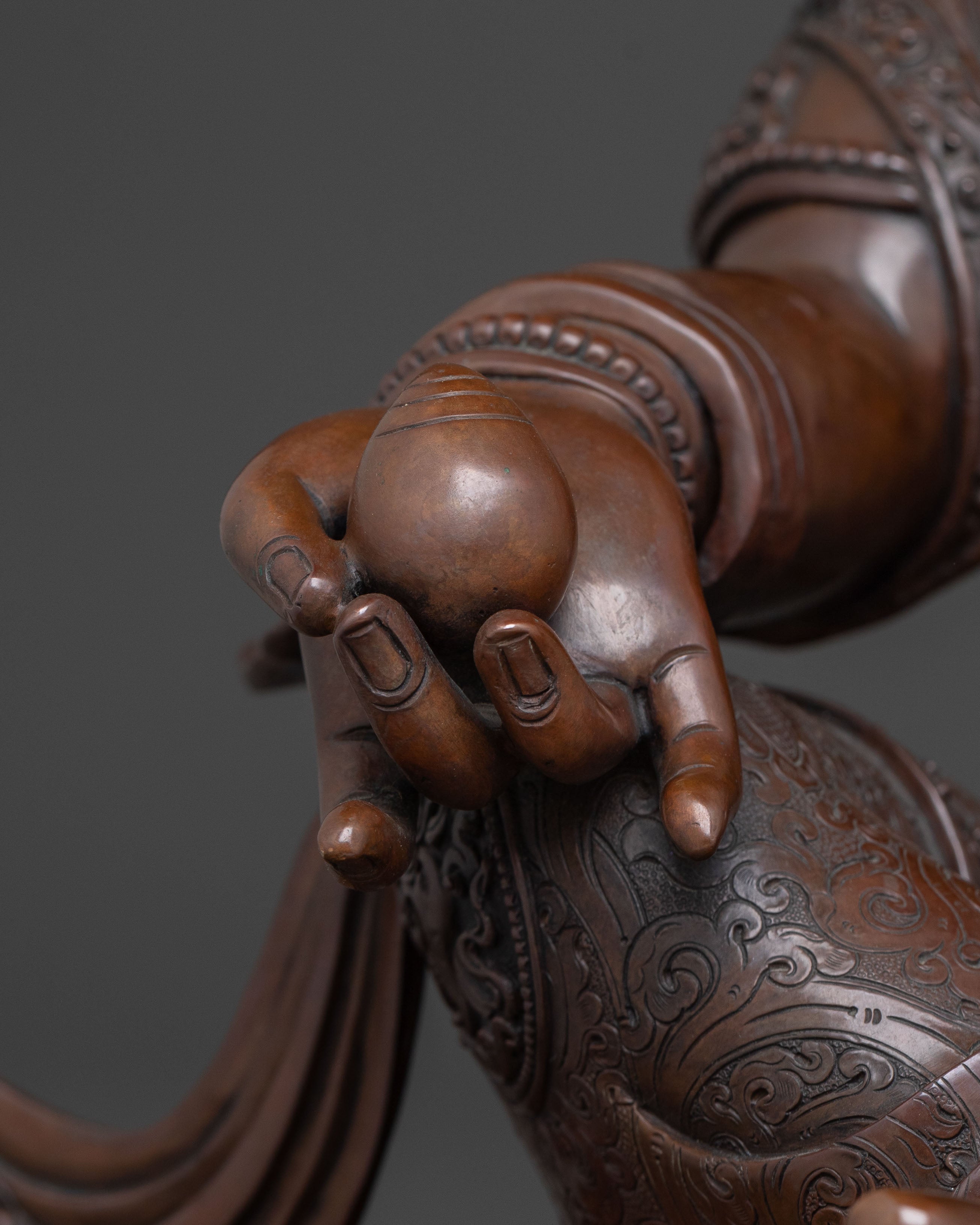 Deity of Wealth: Dzambhala Oxidized Copper Statue