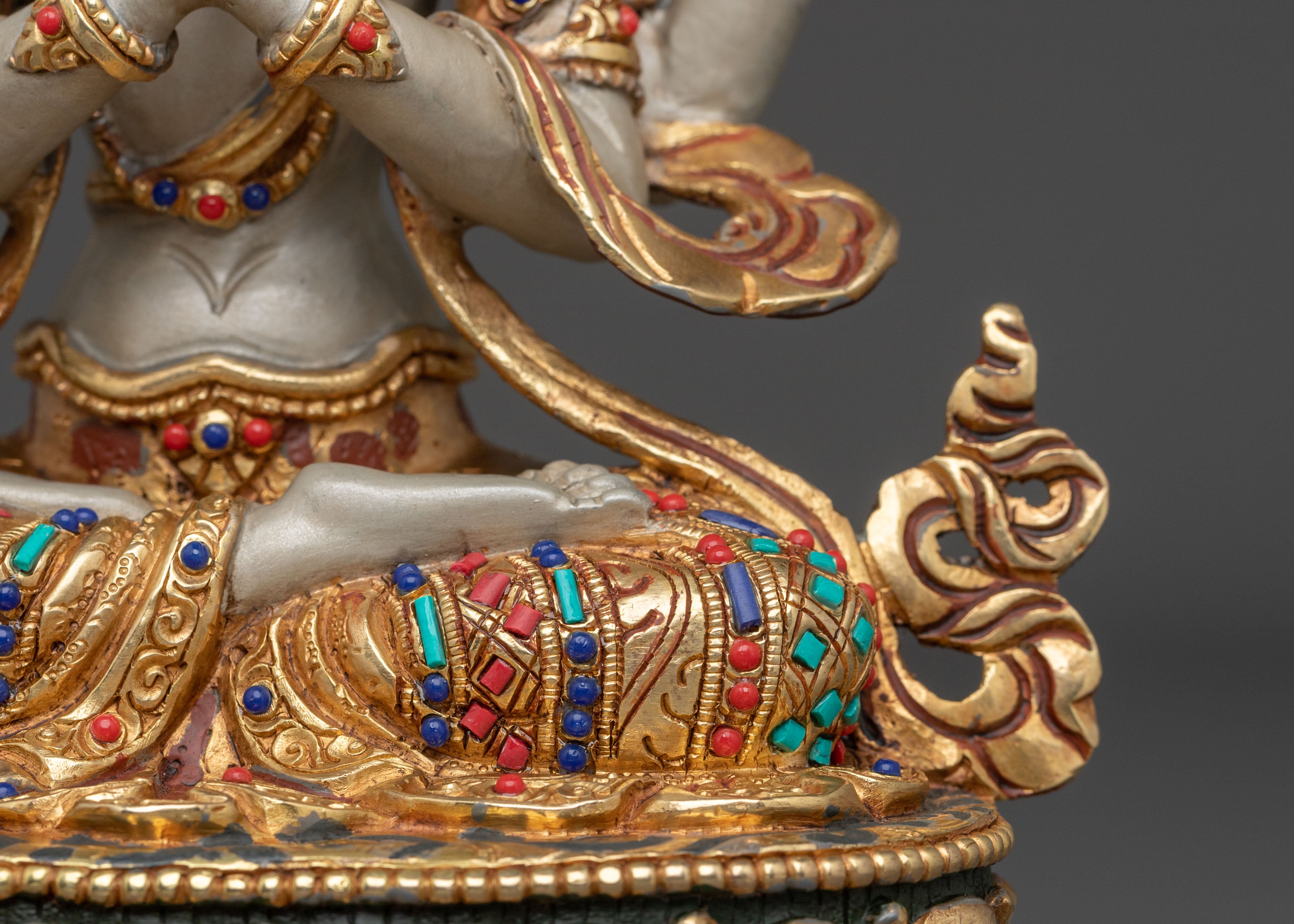 Hand Carved Four Armed Chenrezig Sculpture: Embodiment of Compassion