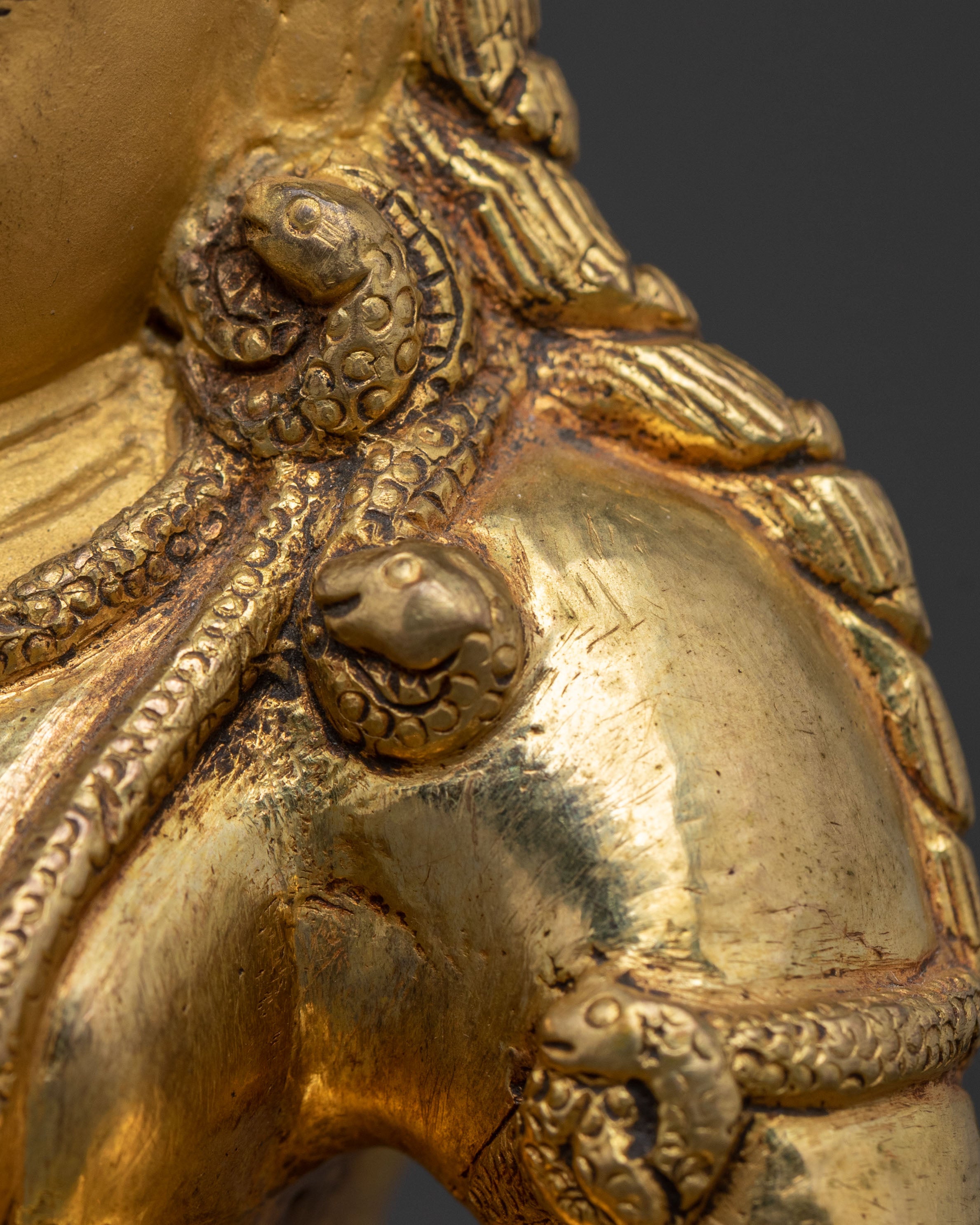 Black Dzambhala Statue: 24K Gold Gilded Guardian