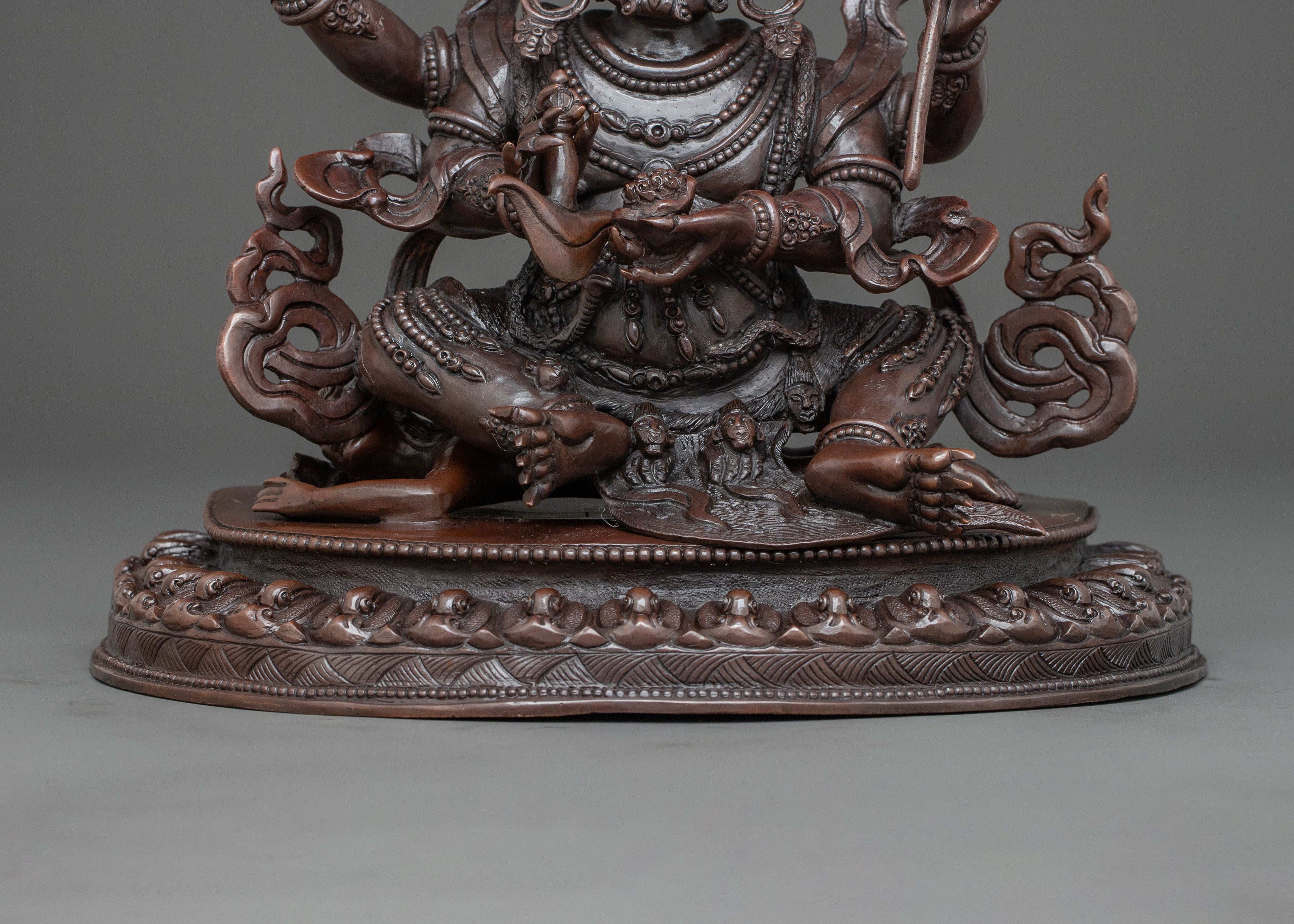 Four Armed Mahakala Statue in Oxidized Copper