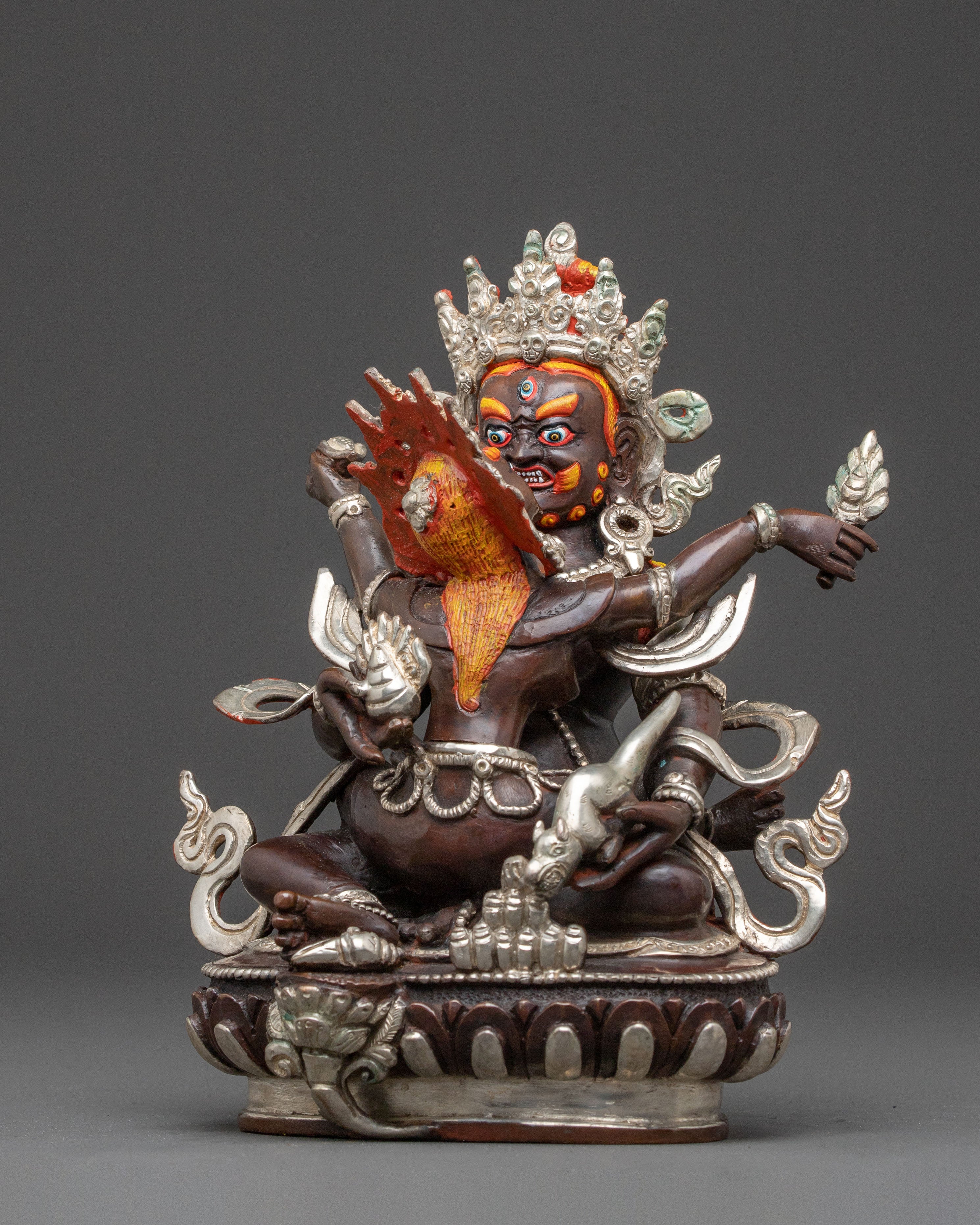 Handcrafted Statue of Red Dzambhala: Oxidized Copper Form