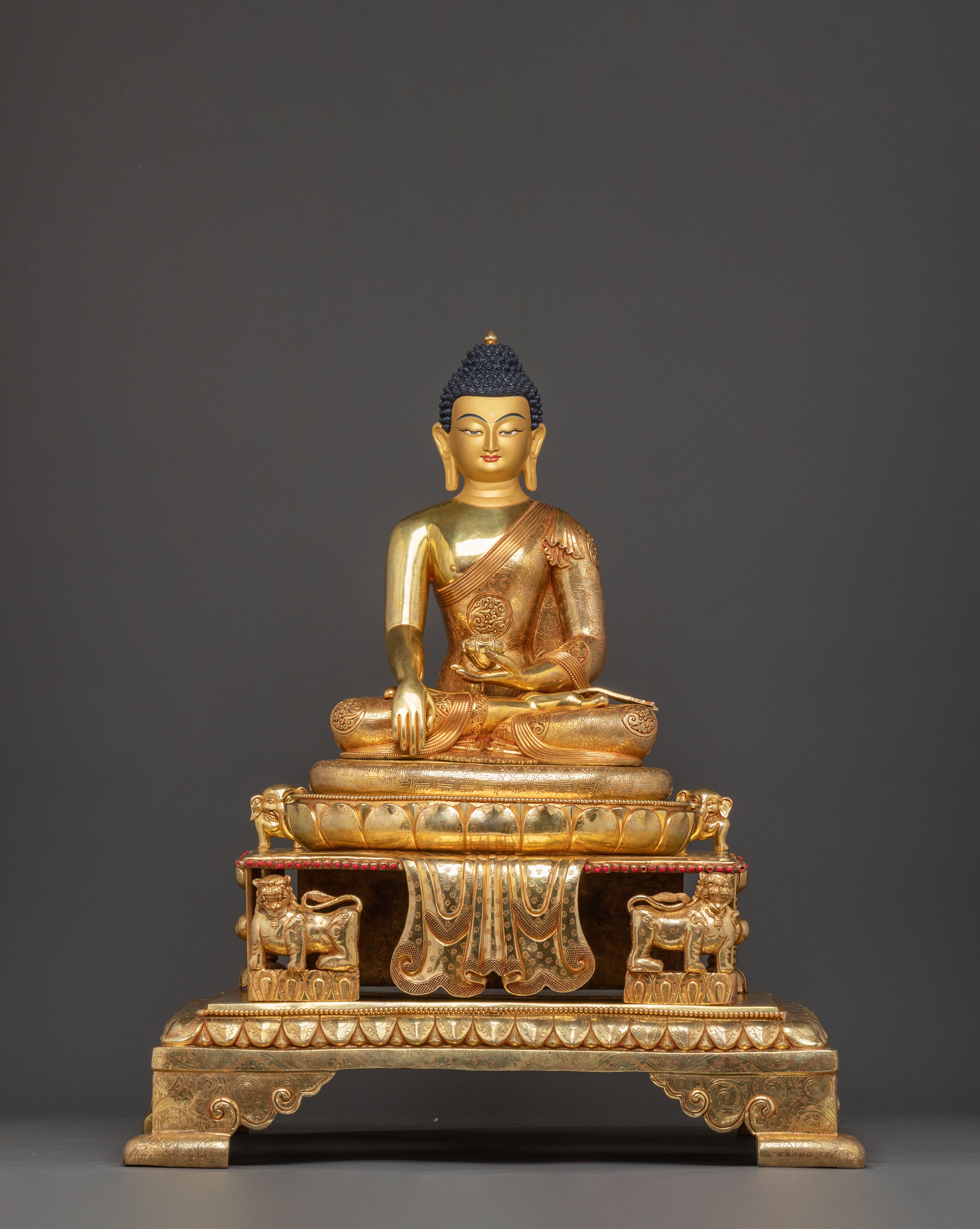 Sacred Statue of Shakyamuni Buddha in Throne – 24K Gold Gilded Artistry