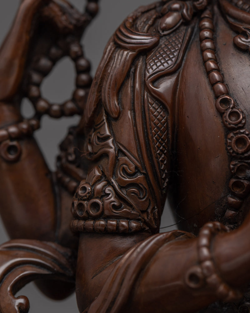 Four Arm Chenrezig Hand-carved Sculpture | Traditional Art of Nepali Artist