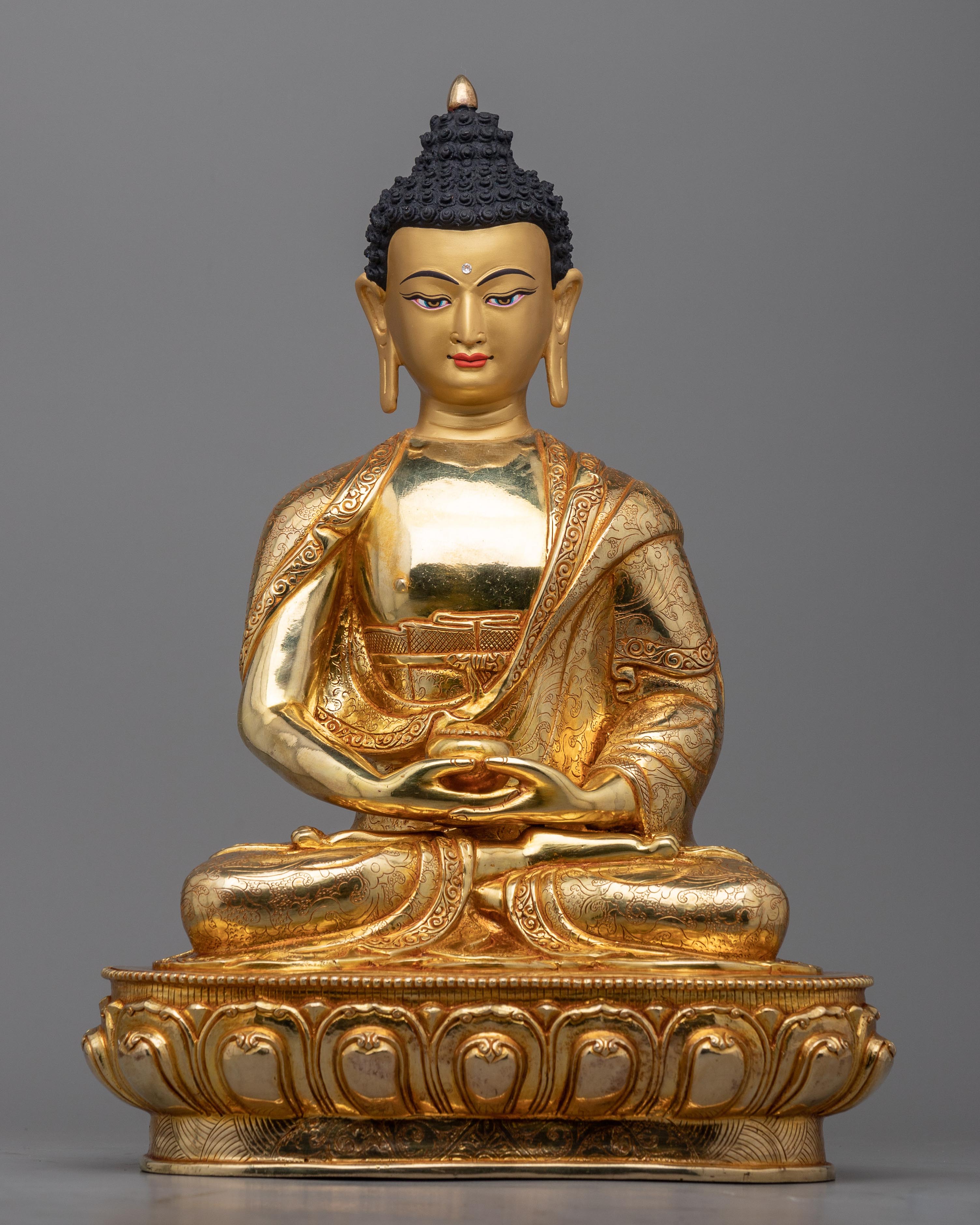 gold statue of buddha 